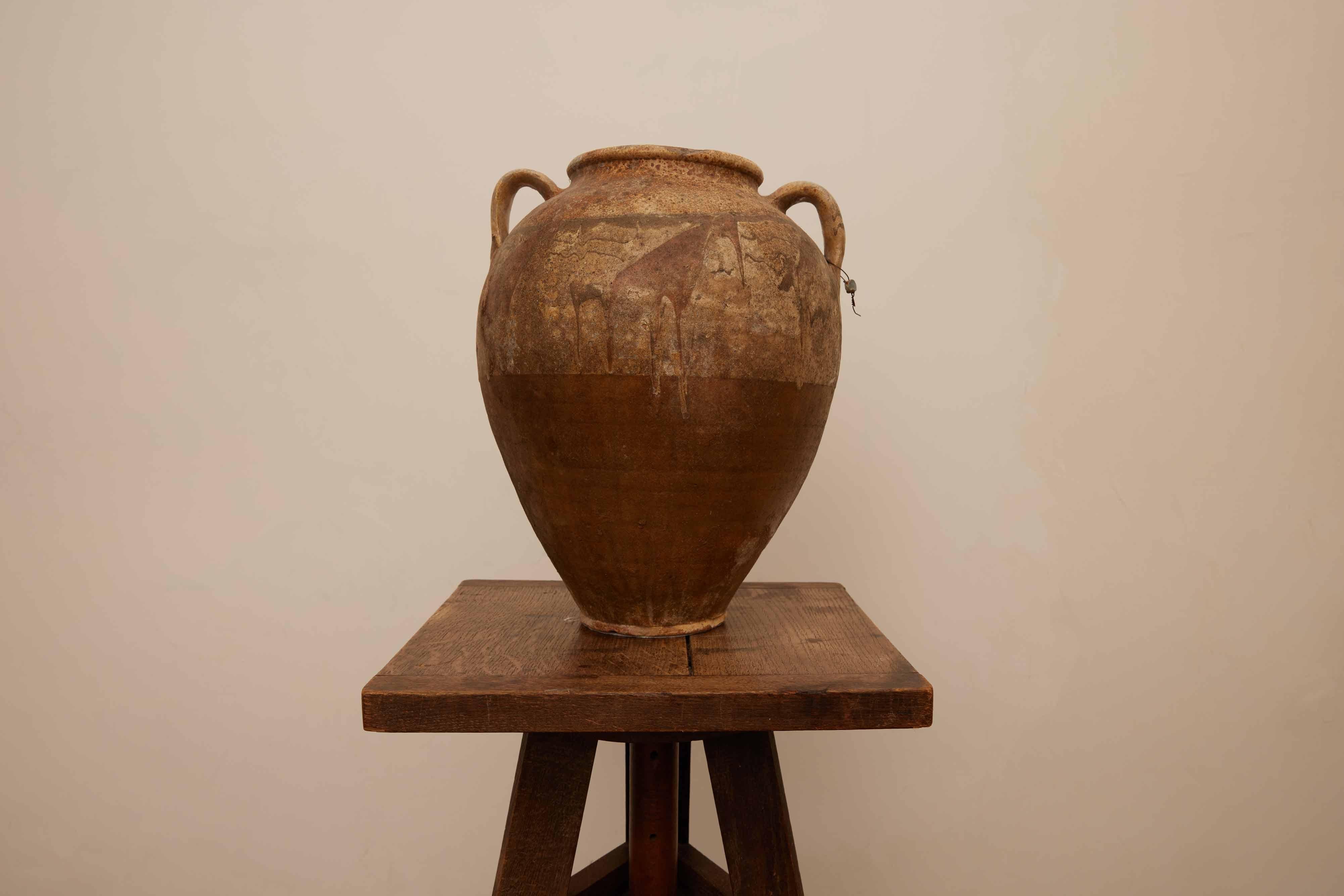 19th Century Moroccan Vessel  

Discover the enchanting beauty of Moroccan craftsmanship with this exquisite mid-19th-century vessel. A testament to the rich history and artistry of Morocco, this piece stands out with its lovely patina, a visual
