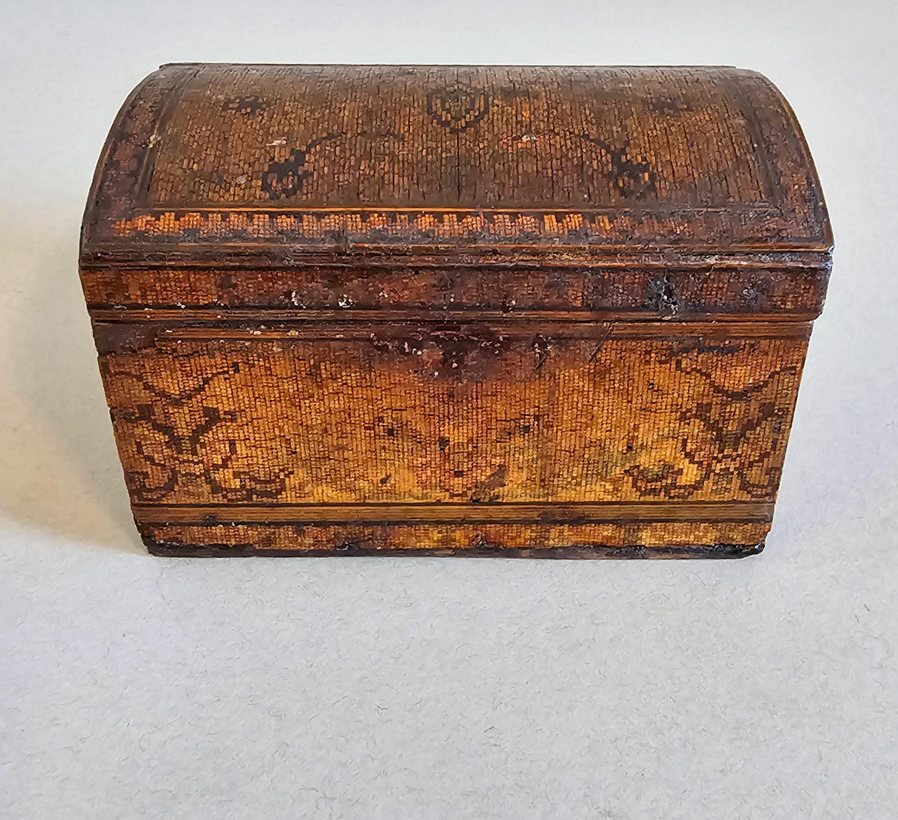 A rare and stunning small mosaic intarsia marquetry inlaid dome-top chest form table box with beautifully aged heavily worn distressed patina. 

Imagine the countless hours it must have taken a highly trained artisan to secure each and every tiny