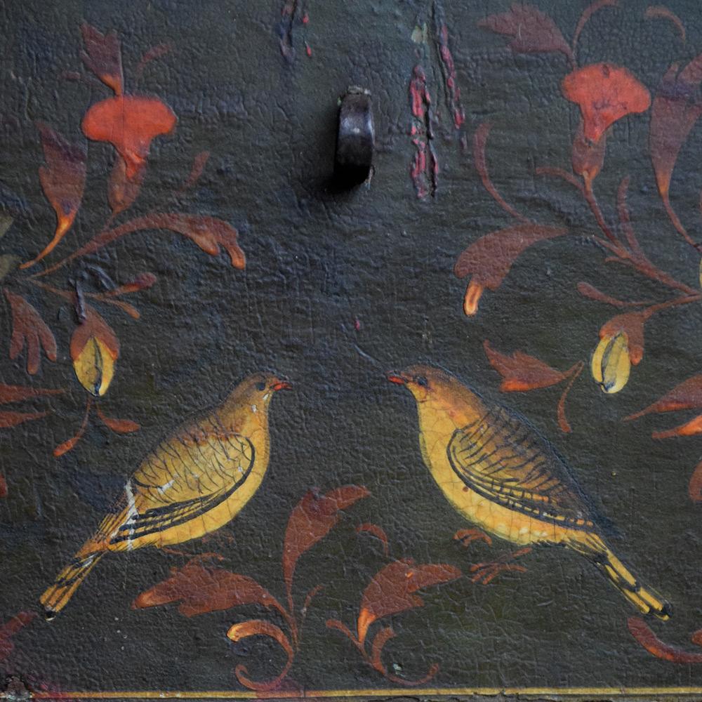 19th century Mughal painted wooden box 

We are proud to offer a mid-19th century hand crafted Indian compartmental wooden box. Covered in ornate floral, bird and figure hand painted designs, this unique and highly decorative box looks scratch