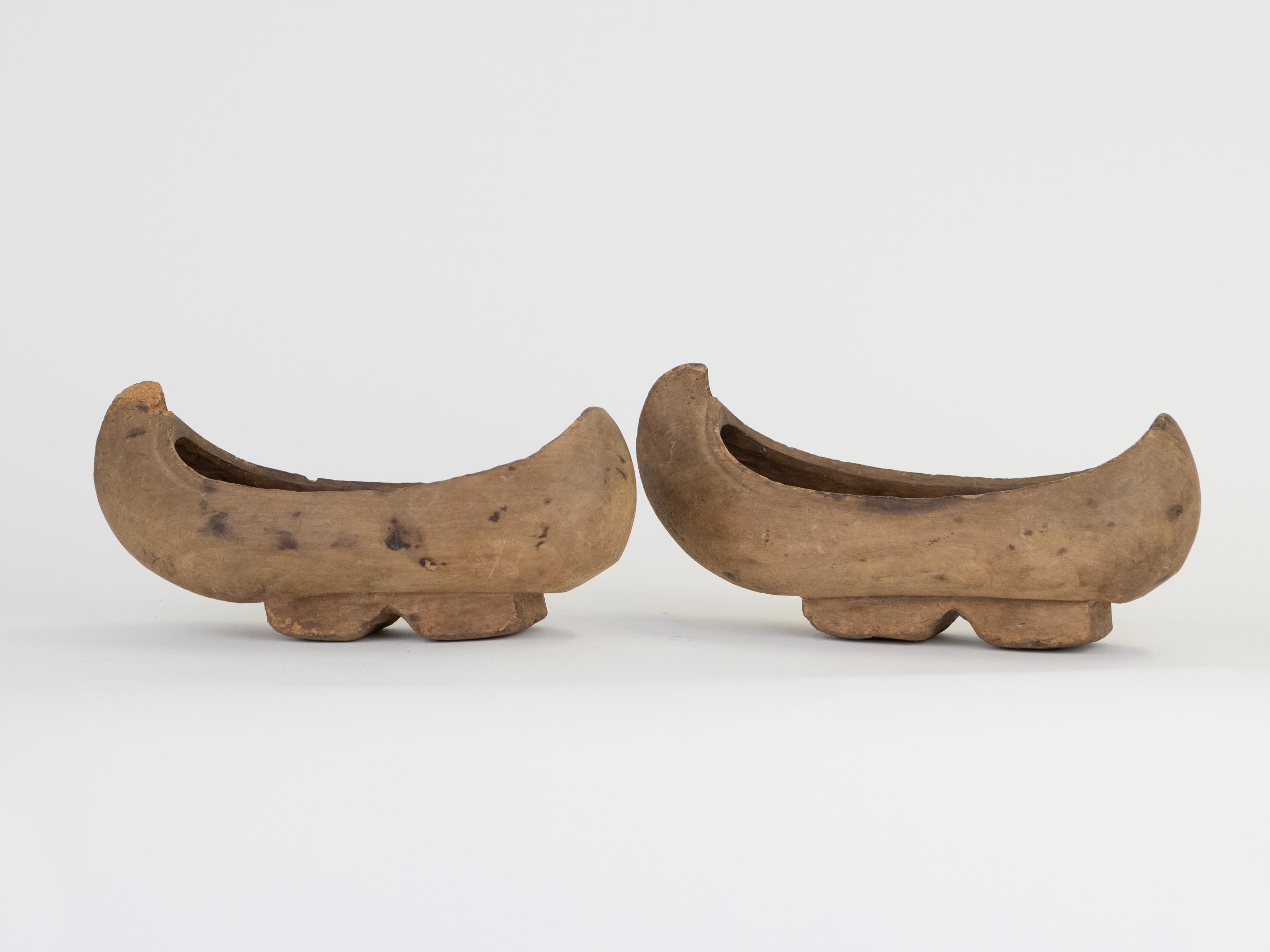Although carved for wearing in the 19th Century, the pretty decorative wooden hand carved clogs make a beautiful object  for styling shelves or on a stack of books to bring new life to the pieces in modern times. 