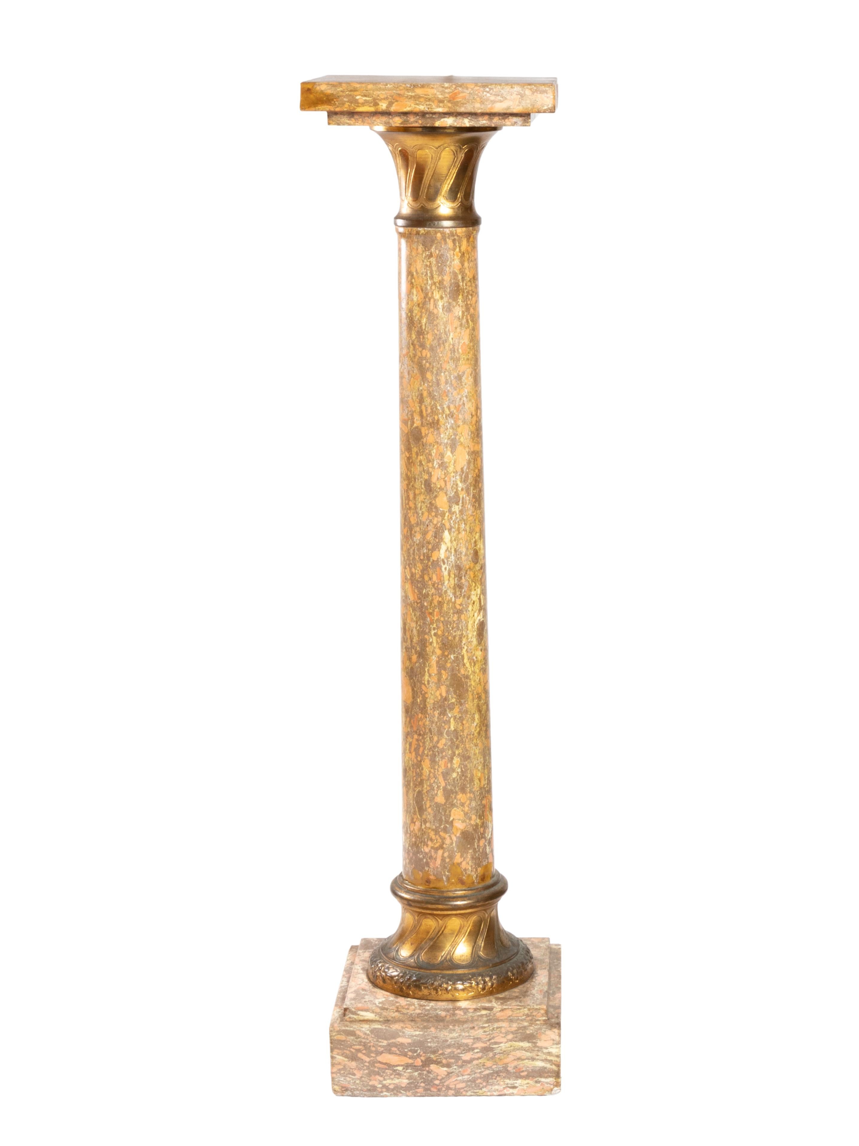 A brocatelle Jaune marble, set on a square and terraced base with gilted bronze details in Napoleon III style and period, circa 1870