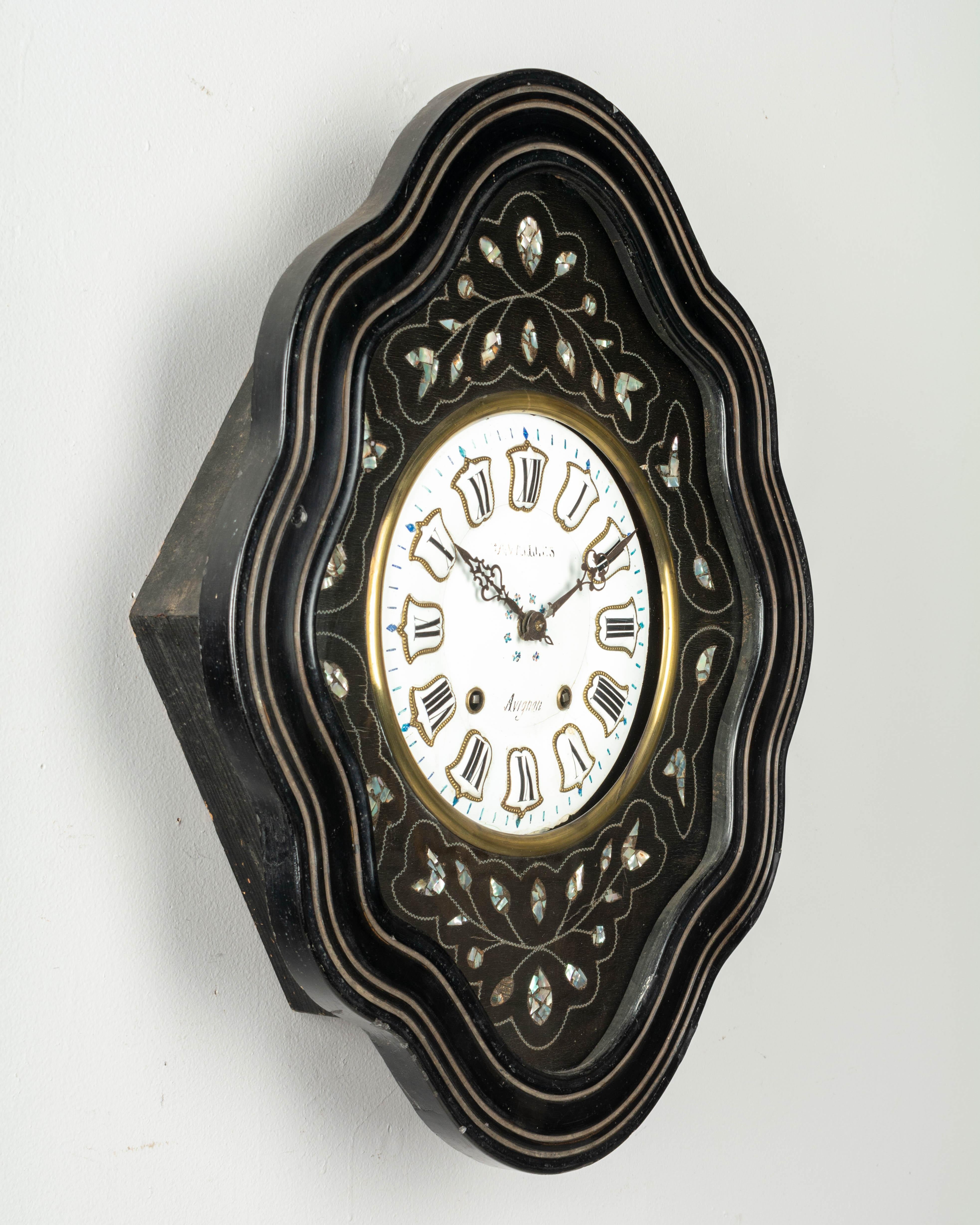 A 19th century French Napoleon III wall clock from Avignon with 