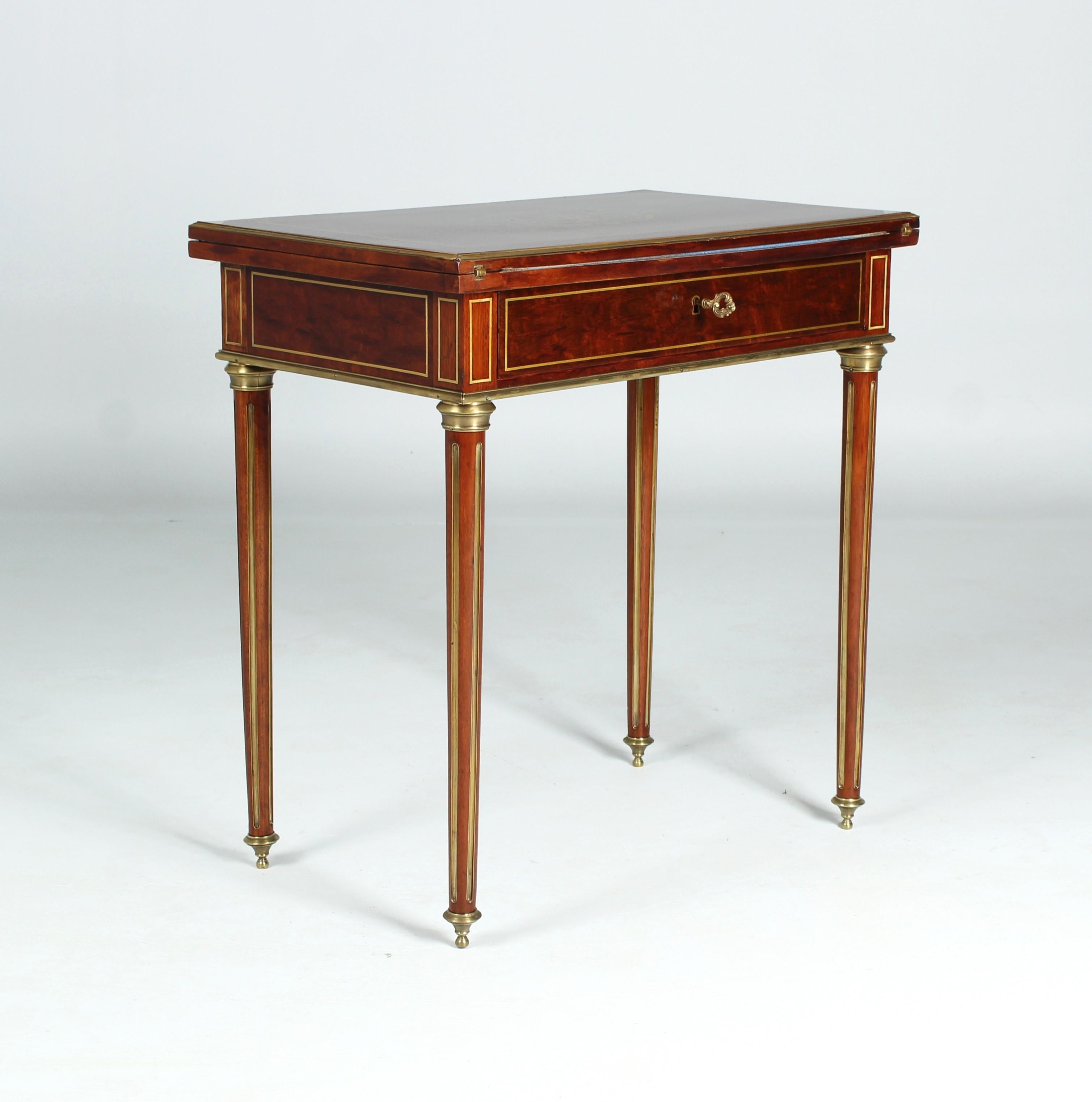 Small antique desk, dressing table or game table

France
Wood, brass
Around 1870

Dimensions: H x W x D: 73 x 70 x 44 cm

Description:
Rare French transformation furniture in Louis XVI style from the so-called Napoleon III era.

In the