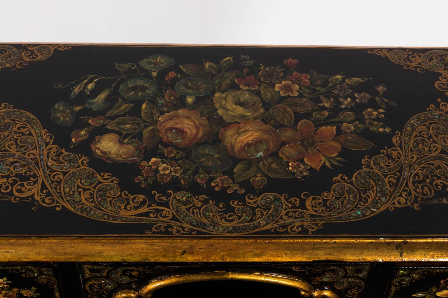 This is an original Napoleon III piece dated anywhere between 1850-1870. The floral decor is hand-painted with gold stamping and embellished with mother-of-pearl inserts, very high quality of craftsmanship. This desk belonged to Maria Felix.
 