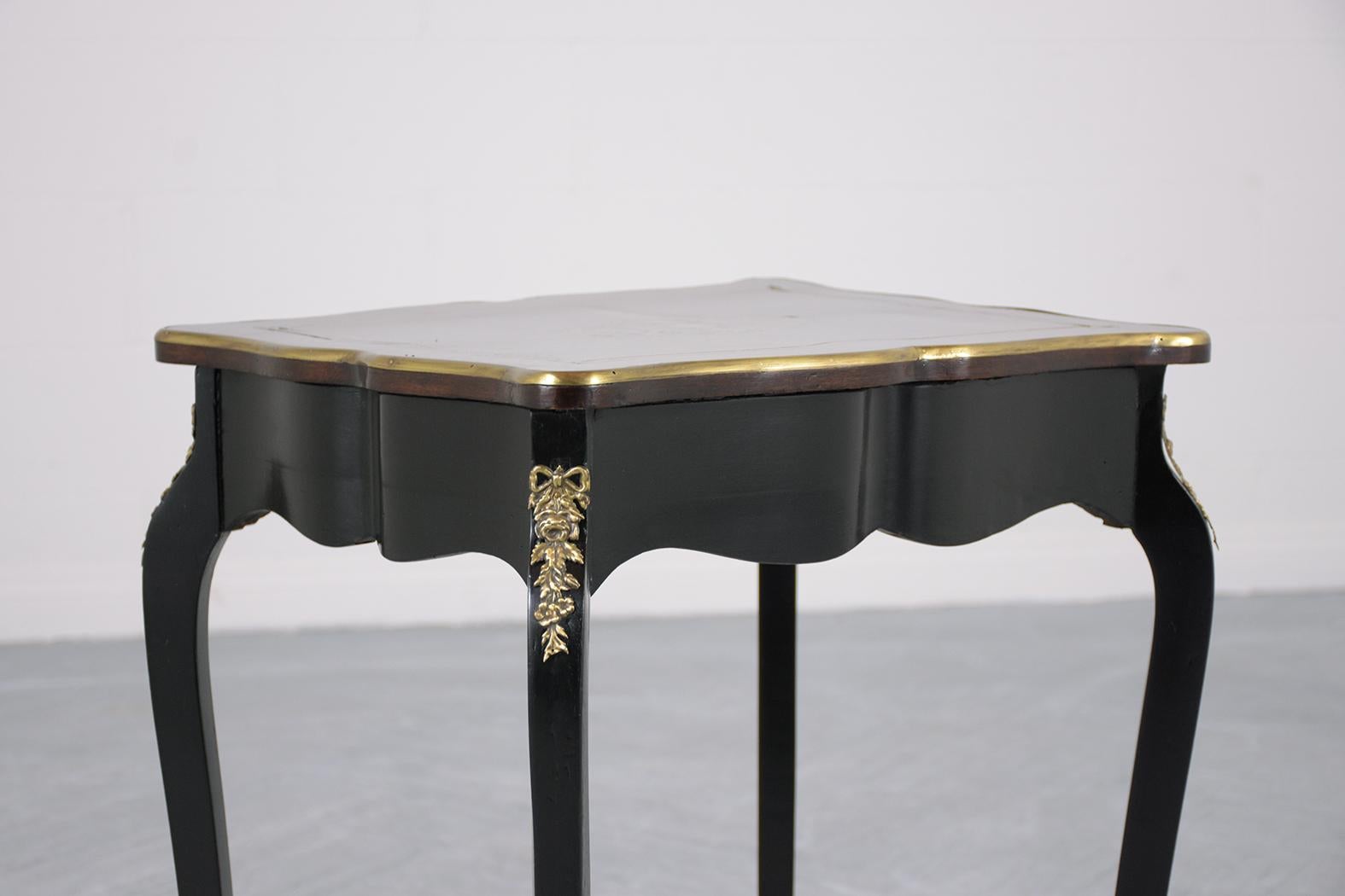 Mahogany Elegant French Napoleon III Ebonized Marquetry Side Table with Brass Accents For Sale