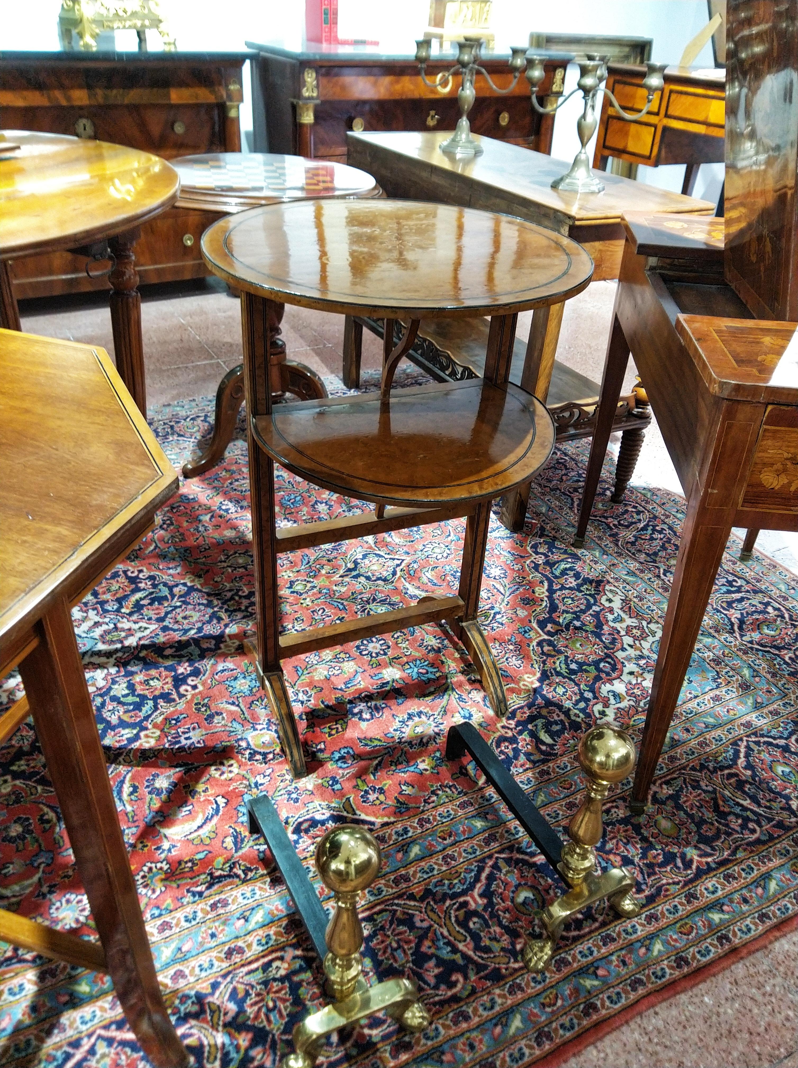 Fine Italian side table, Napoleon III, second half of the 19th century, inlaid, thuja root.

Small folding table with two shelves. Threaded and inlaid, ideal for a salon.

The Napoleon III style was a highly eclectic style of architecture and