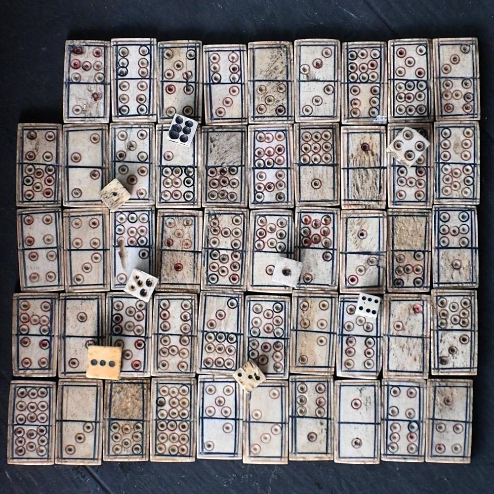 19th Century Napoleonic Prisoner of War Painted Casket Dominoes Set

A stunning example of an early 19th century Napoleonic prisoner of war hand painted casket dominos set. One of the most detailed and finely hand carved pieces of folk art we have