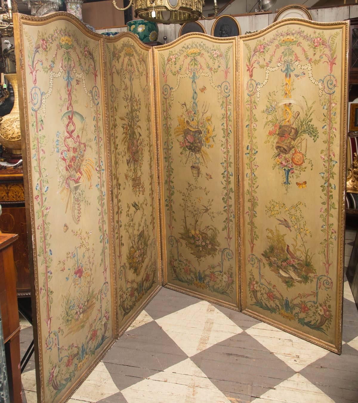 Painted in the Louis XVI neoclassic style on four panels of wood. The back is plain.
Hinges allow each of the four panels to move left or right. Gold colored carved frame.
Each panel is 25 inches wide.

    