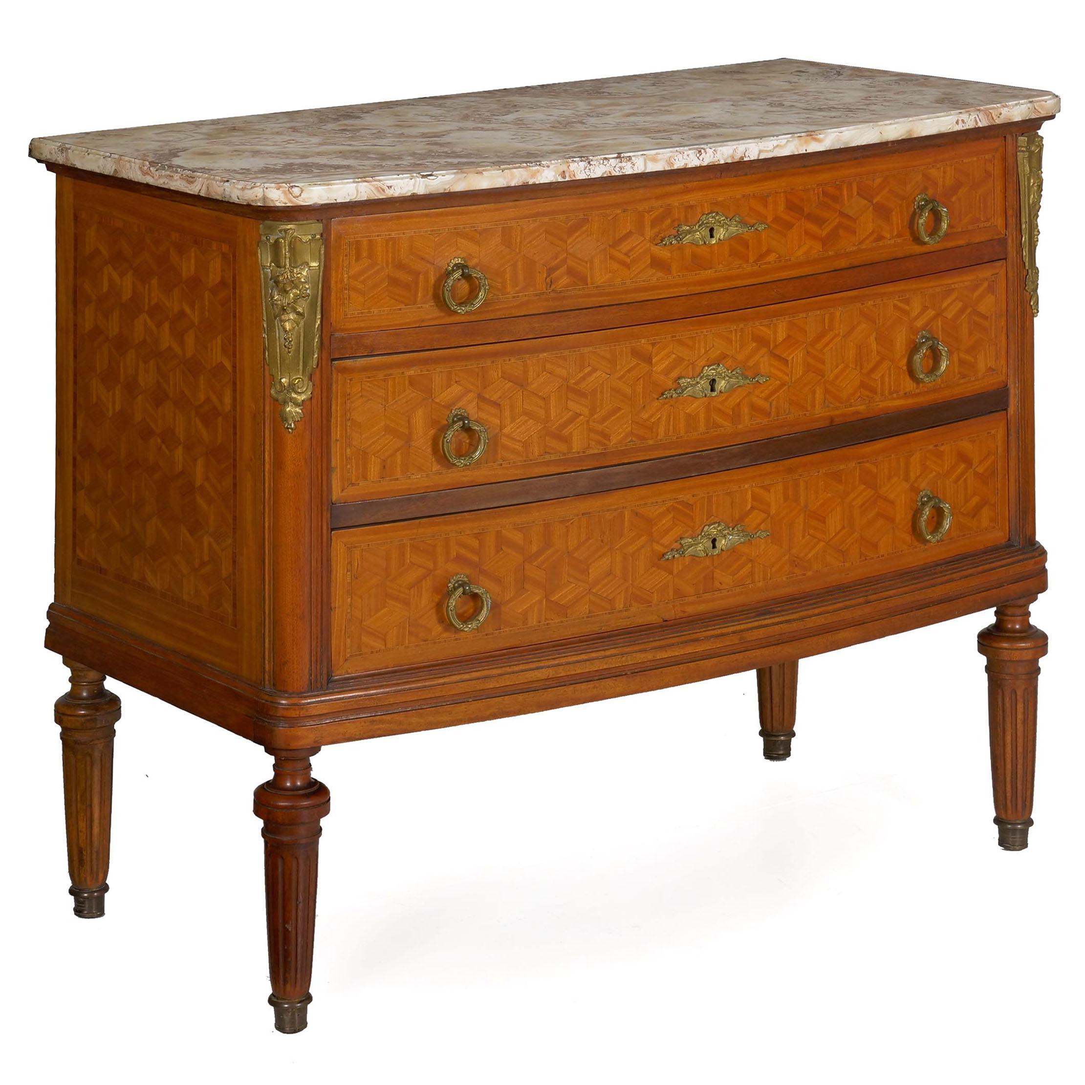 Neoclassical cube-parquetry inlaid three-drawer commode.
Continental, circa late 19th century.
Item # 007GUO30P 

An absolutely gorgeous three-drawer commode from the last quarter of the 19th century, this Fine presentation piece features a