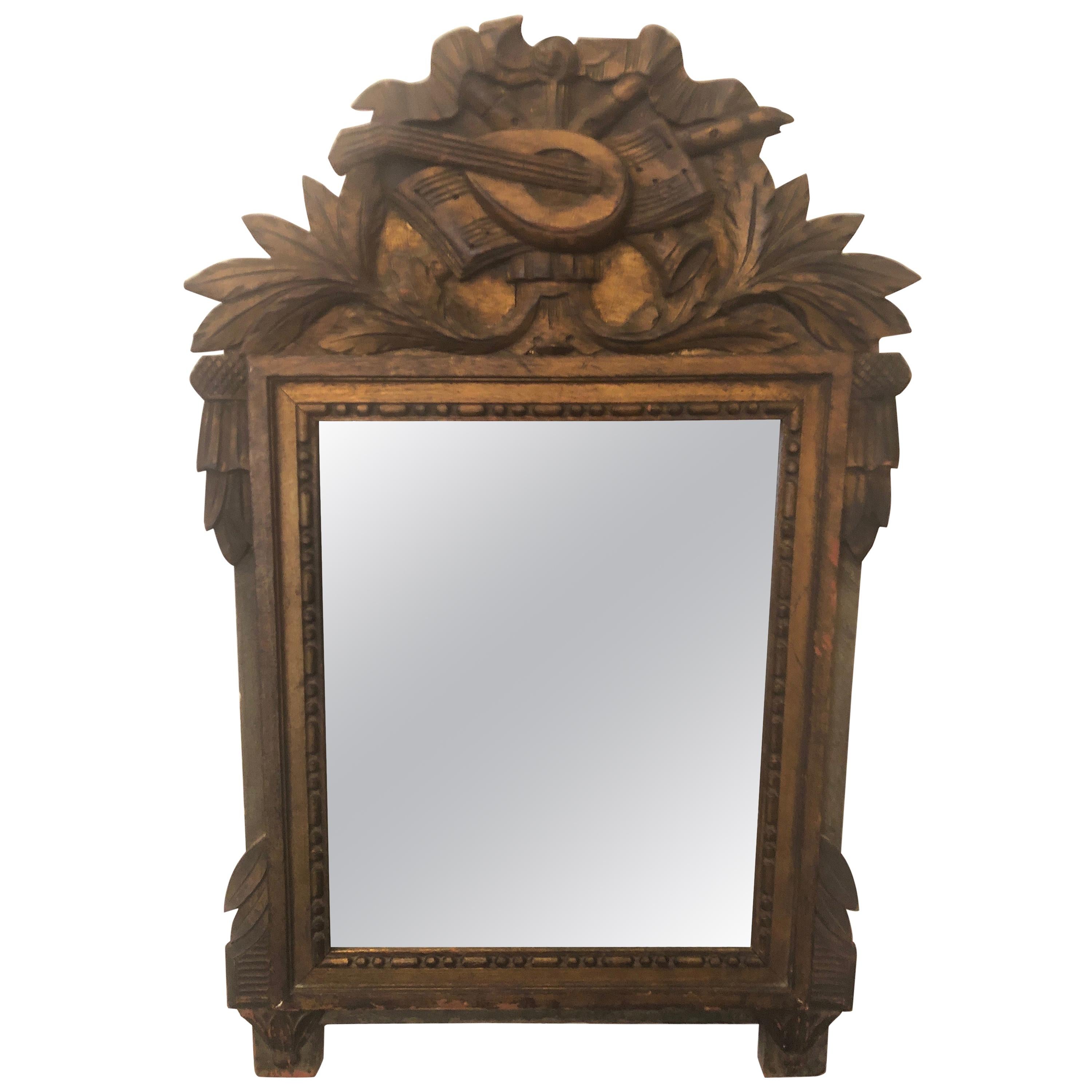 19th Century Neoclassical Carved Giltwood Mirror with Mandolin For Sale