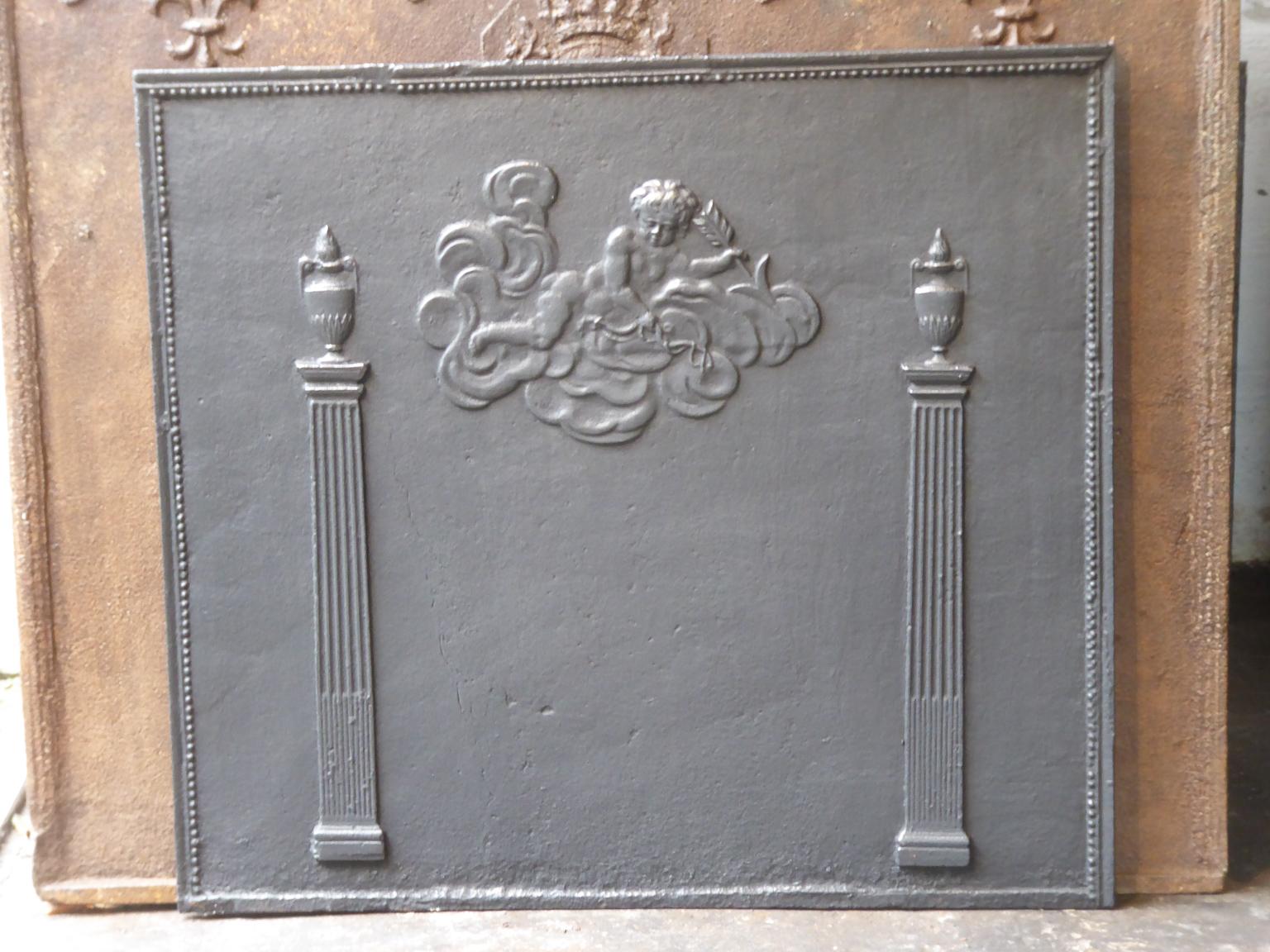 19th century neoclassical French fireback with an allegory of love. The fireback is made of cast iron and has a natural brown patina. Upon request it can be made black / pewter. The fireback is in a good condition and does not have cracks.