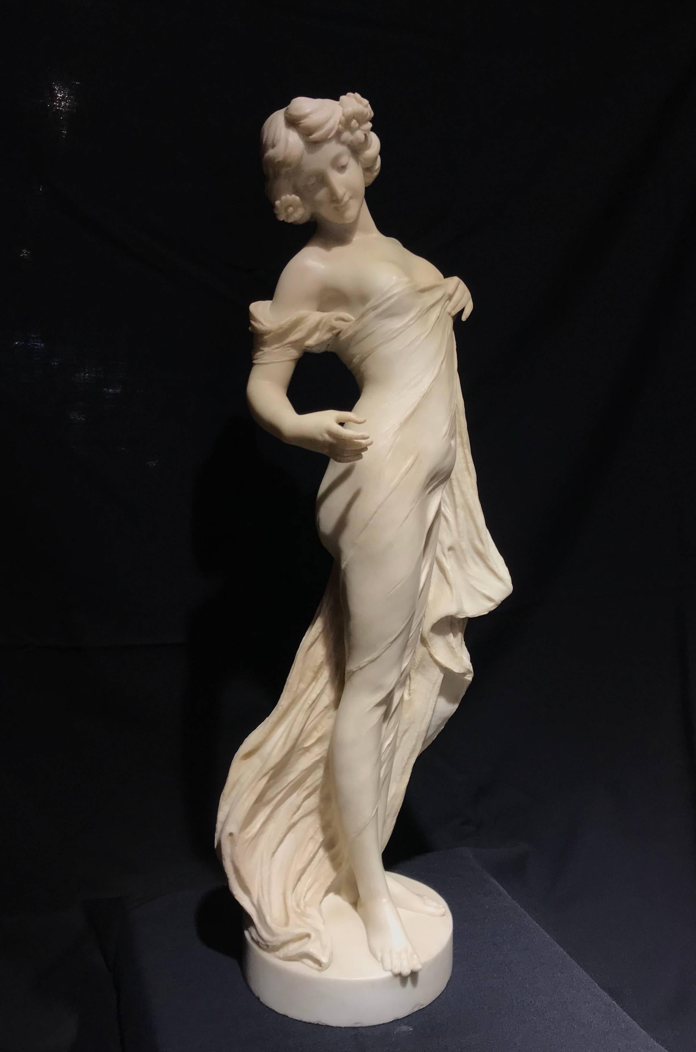 A very beautiful and elegant sculpture of a nymph, carved in Italy and with the typical character and signs of the artworks made in Florence in the 19th century. This huge and impressive for the quality of the carving sculpture is attributed to the