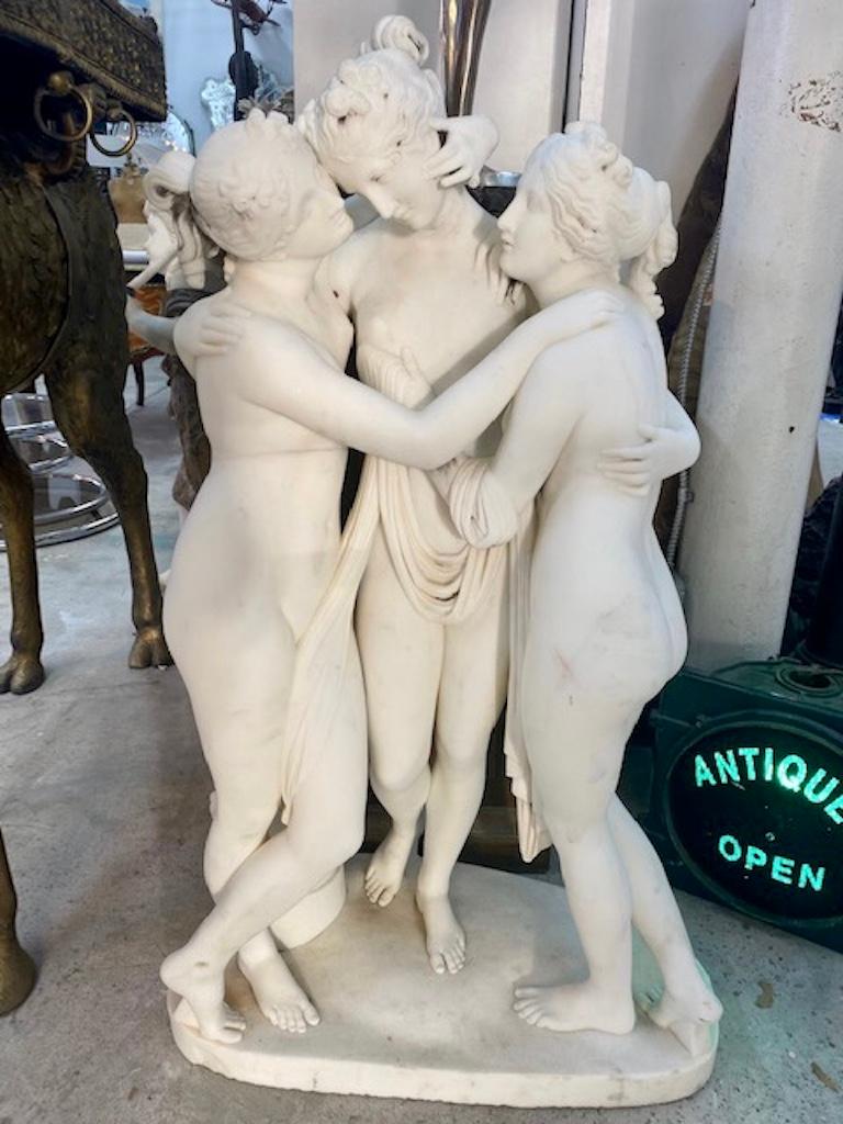 Large 19th century neoclassical carved marble sculpture of the three graces after Canova. A Beautiful execution of one of Canova's Masterpieces. Ours amazingly accurate to the sculptor's original and in an impressive size. Ours dating from the mid