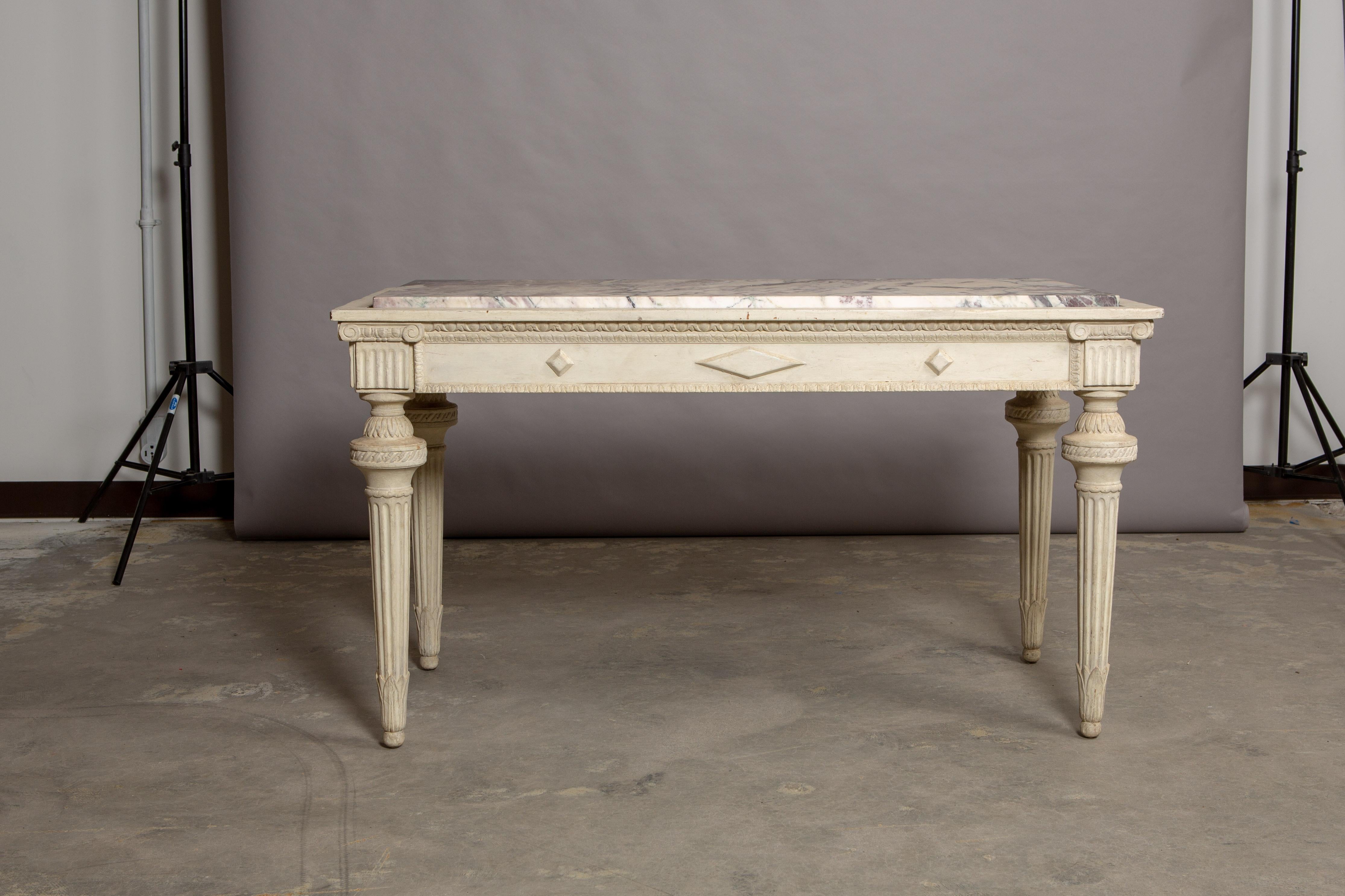 19th century French marble-top table with tapered column style legs and violet breche marble top. Beautiful variegated marble measuring 48.75