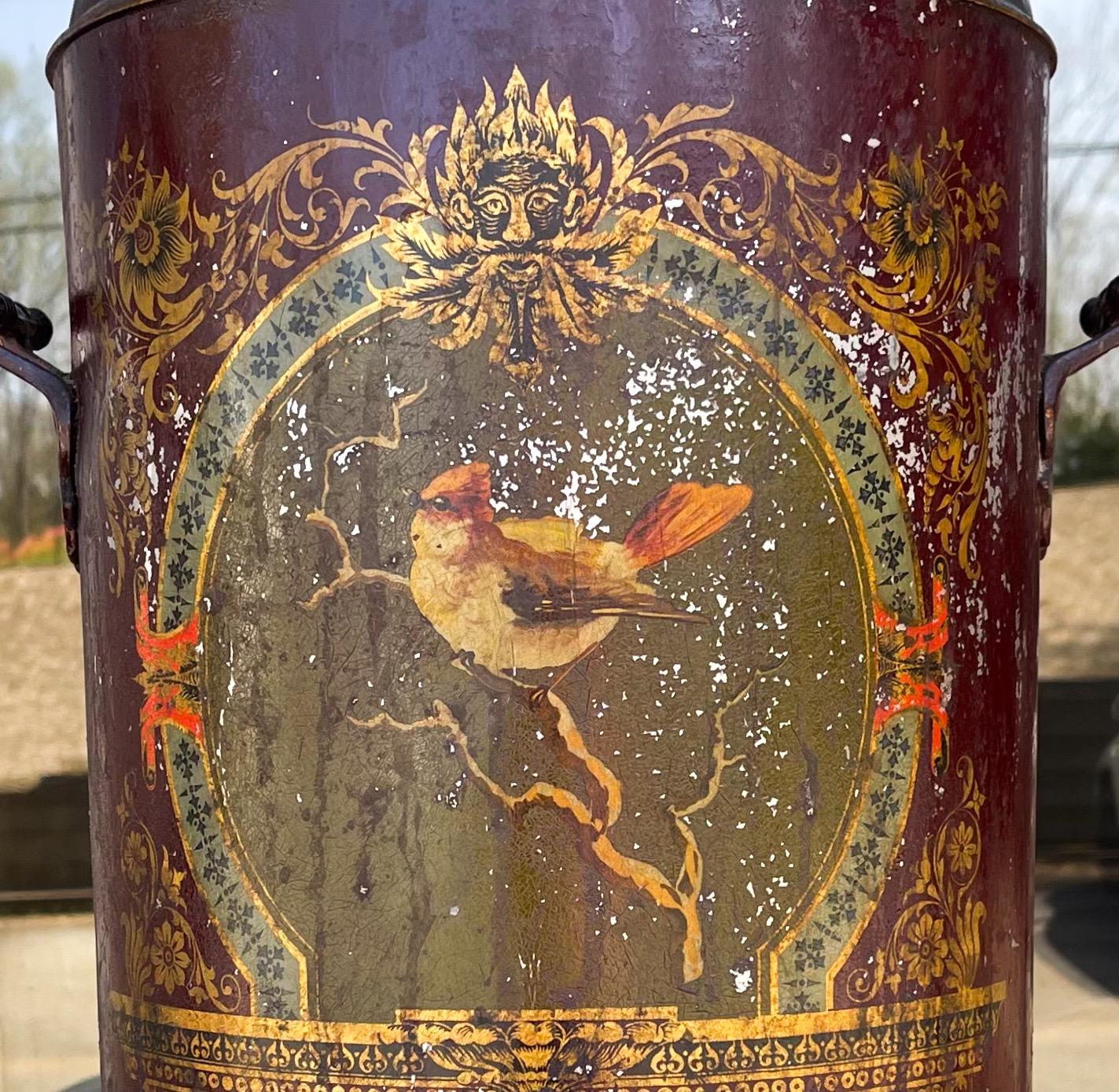 This is a 19th century tole water cooler by Adams & Westlake out of Chicago. It has an enamel interior with a brass spigot. The exterior shows paint losses that add to the patina.