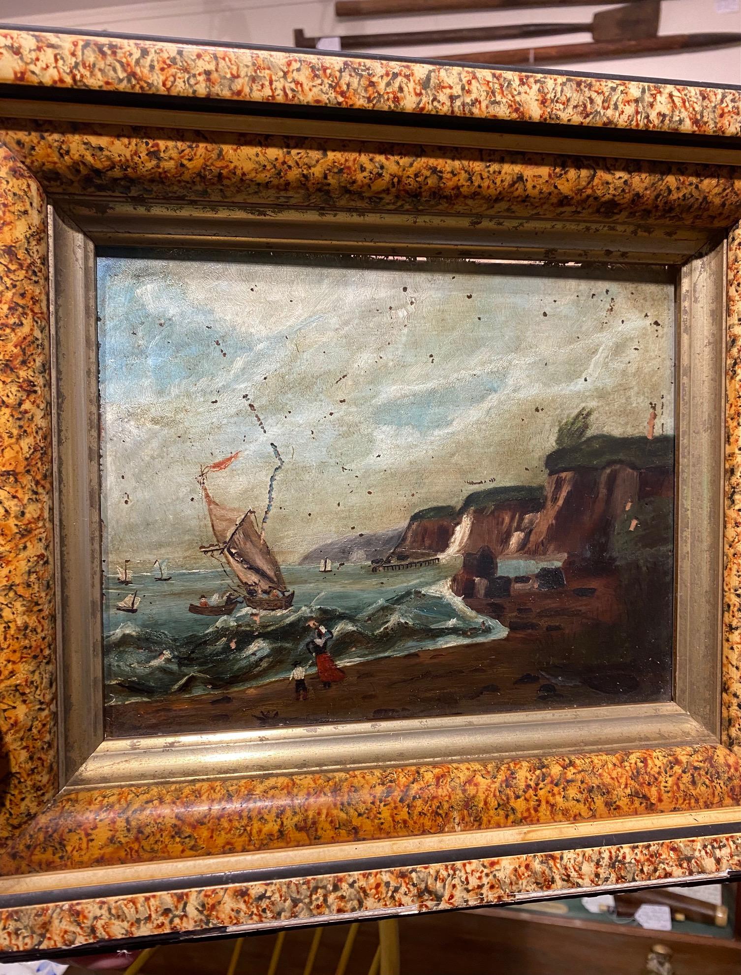 19th Century New England Folk Art reverse painting on glass coastal seascape, circa 1870s, unsigned, depicting a sloop in danger on the rocks, a dory coming to the rescue, figures watching on shore, and many other sails out to sea. Mounted in