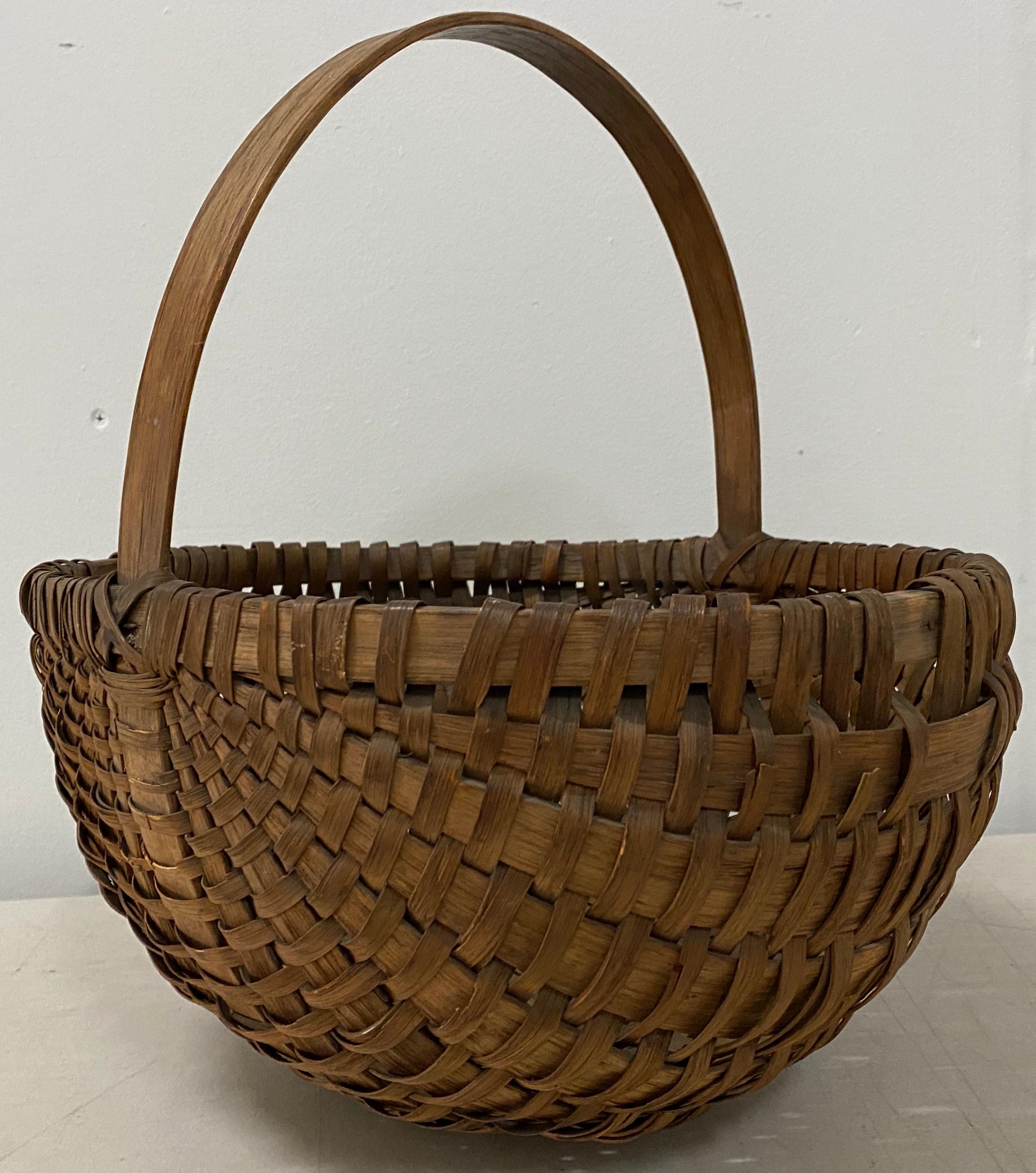19th century new England splint oak basket

Possibly Massachusetts 

Dimensions 14