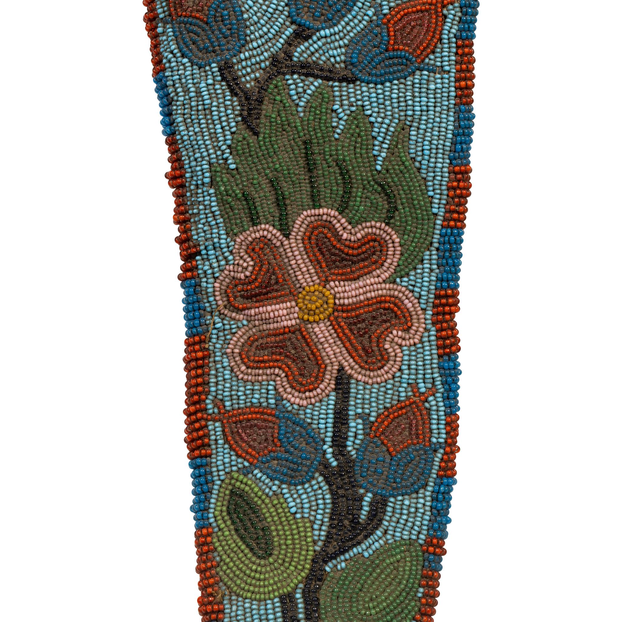 Nez Perce fully contour beaded holster. Blue background with Classic floral design on brain tanned buffalo.

Period: 19th century
Origin: Nez Perce
Size: 13