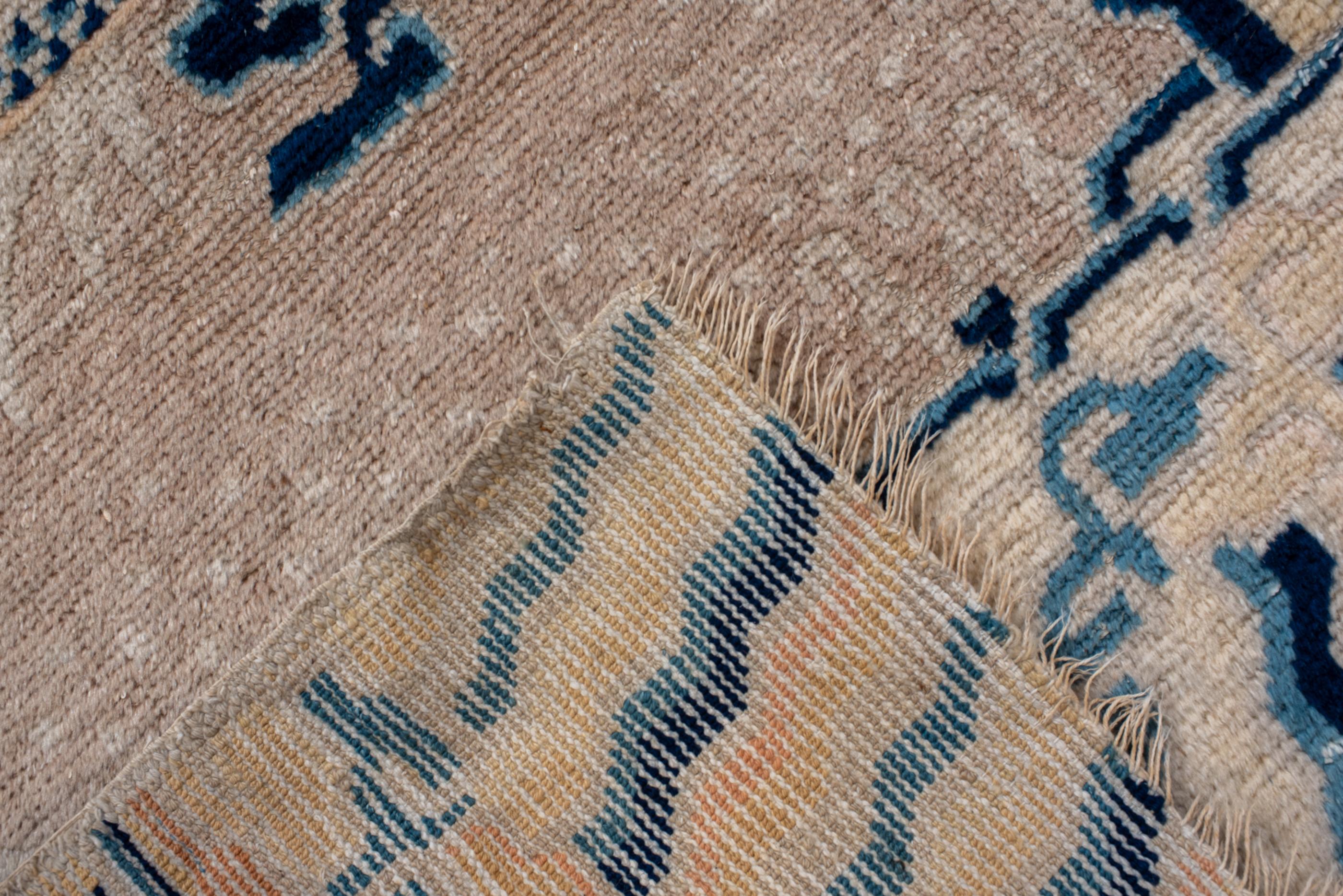 Chinese 19th Century Ningxia Pillar Rug, with Beige Field and Blue Details For Sale