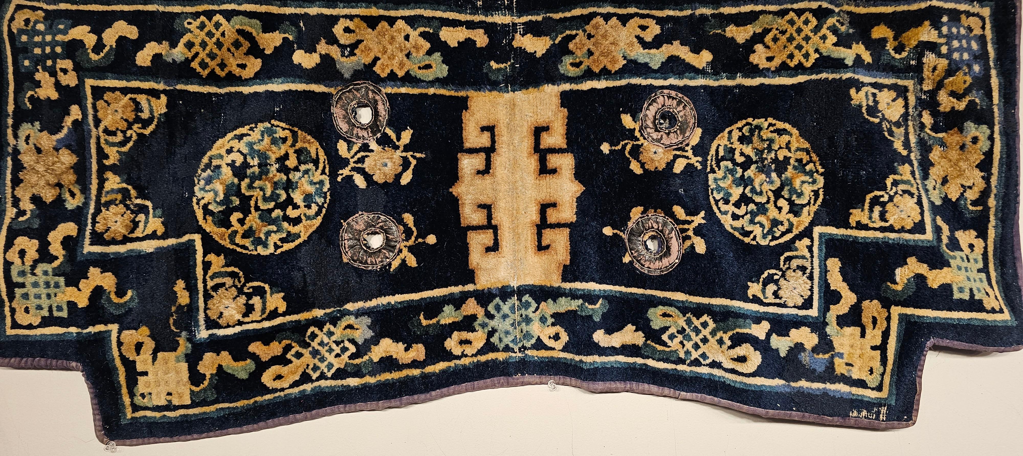 A beautiful Ningxia saddle cover from the western China circa the 3rd quarter of the 19th century.  The antique saddle cover is in wonderful condition for an item being over one hundred years of age and used.  The design in the indio blue  field