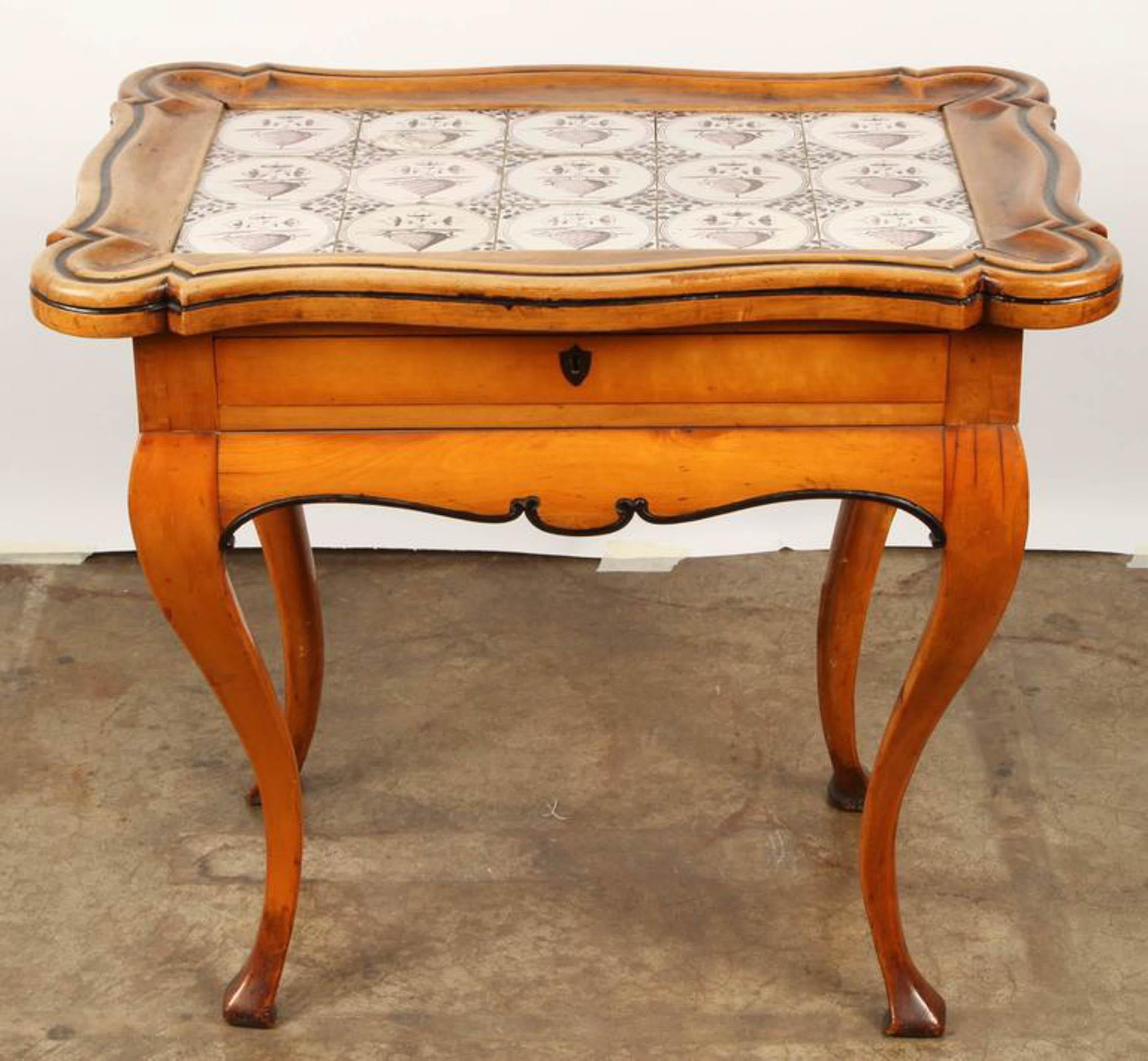 Northern German Rococo style fruitwood table with 