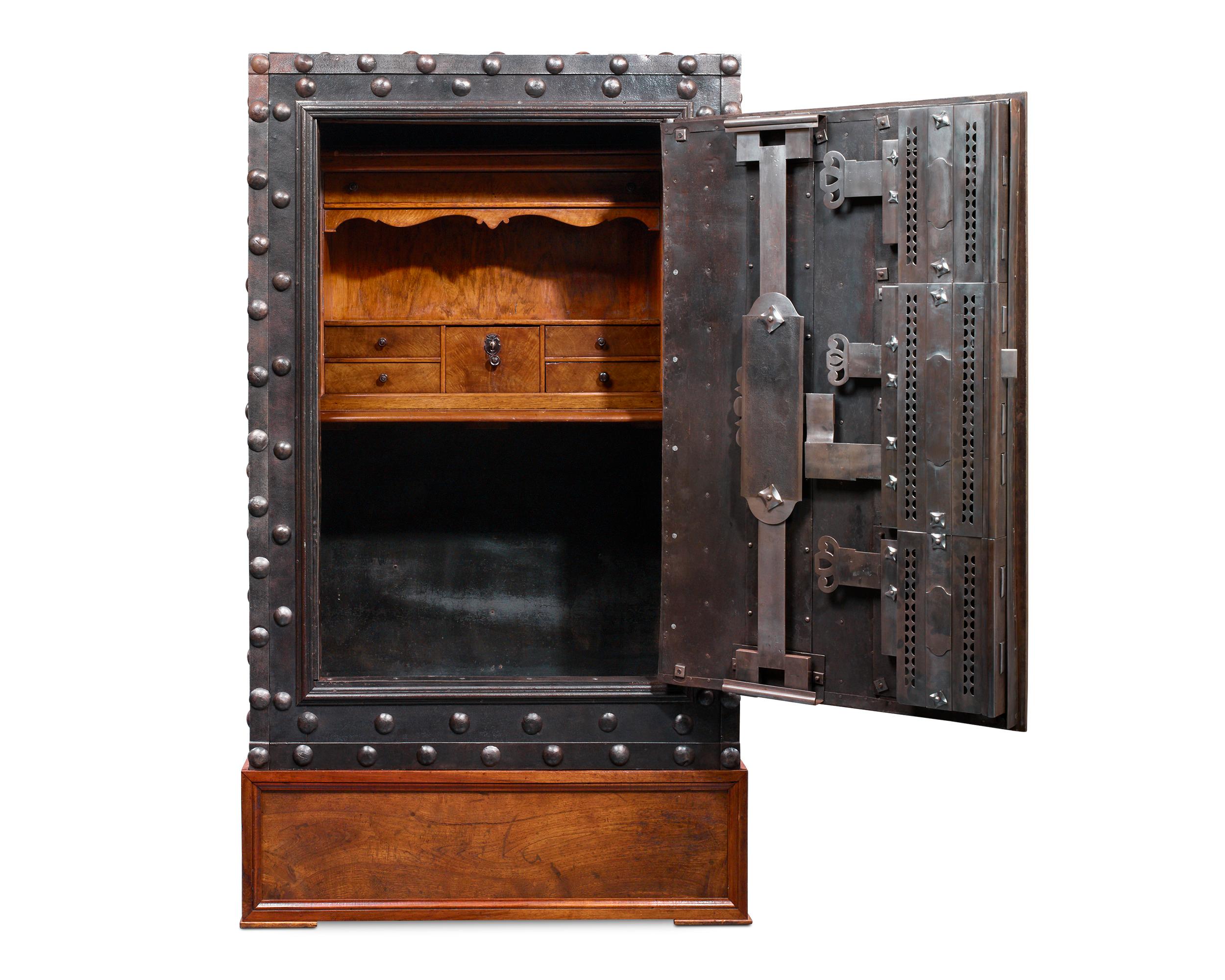 A pièce de résistance of mechanical complexity and exceptional craftsmanship, this fully functioning Italian hobnail safe dates to the turn of the 19th century and was one of the most secure means by which valuables could be stored. Weighing