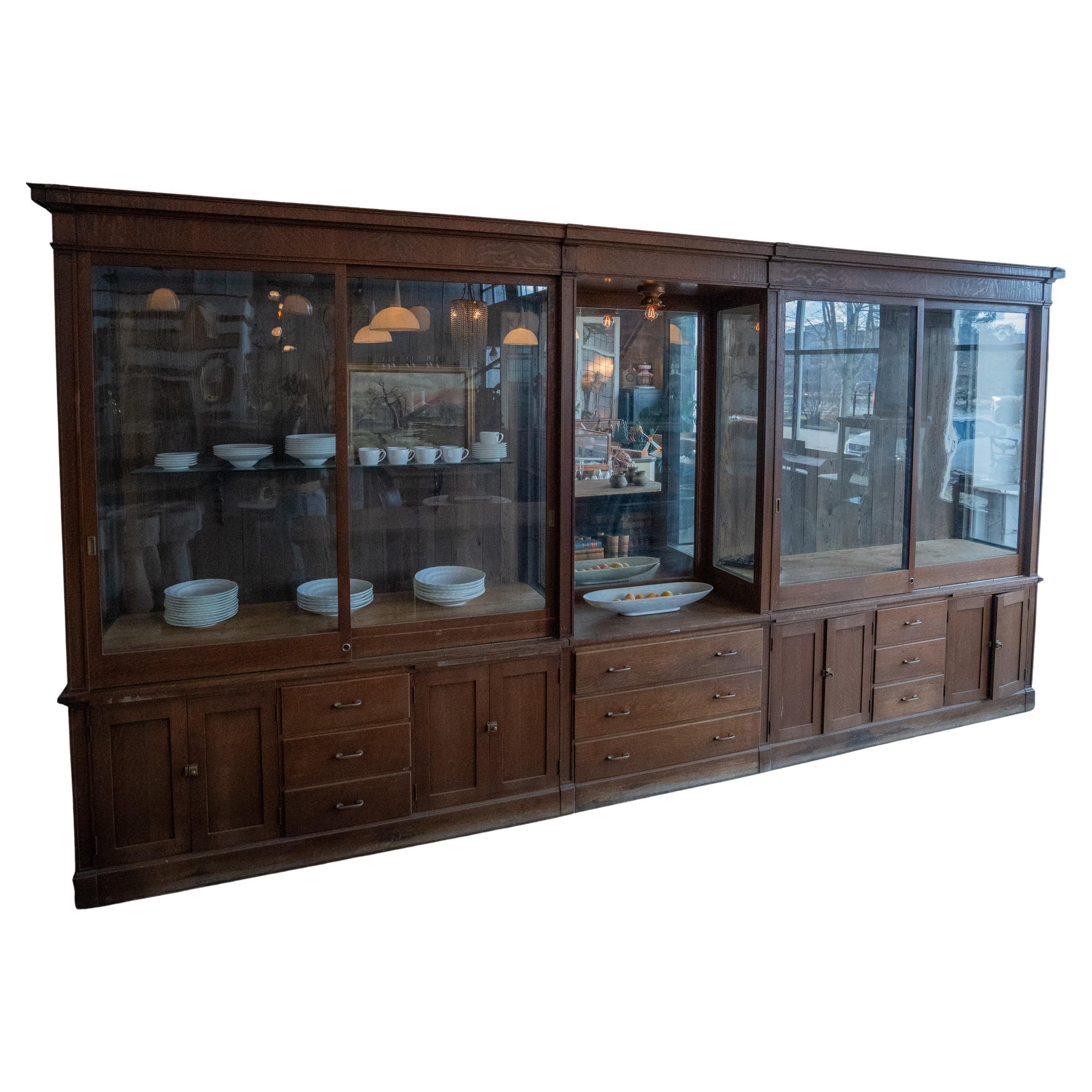 19th century oak American apothecary showcase cabinet