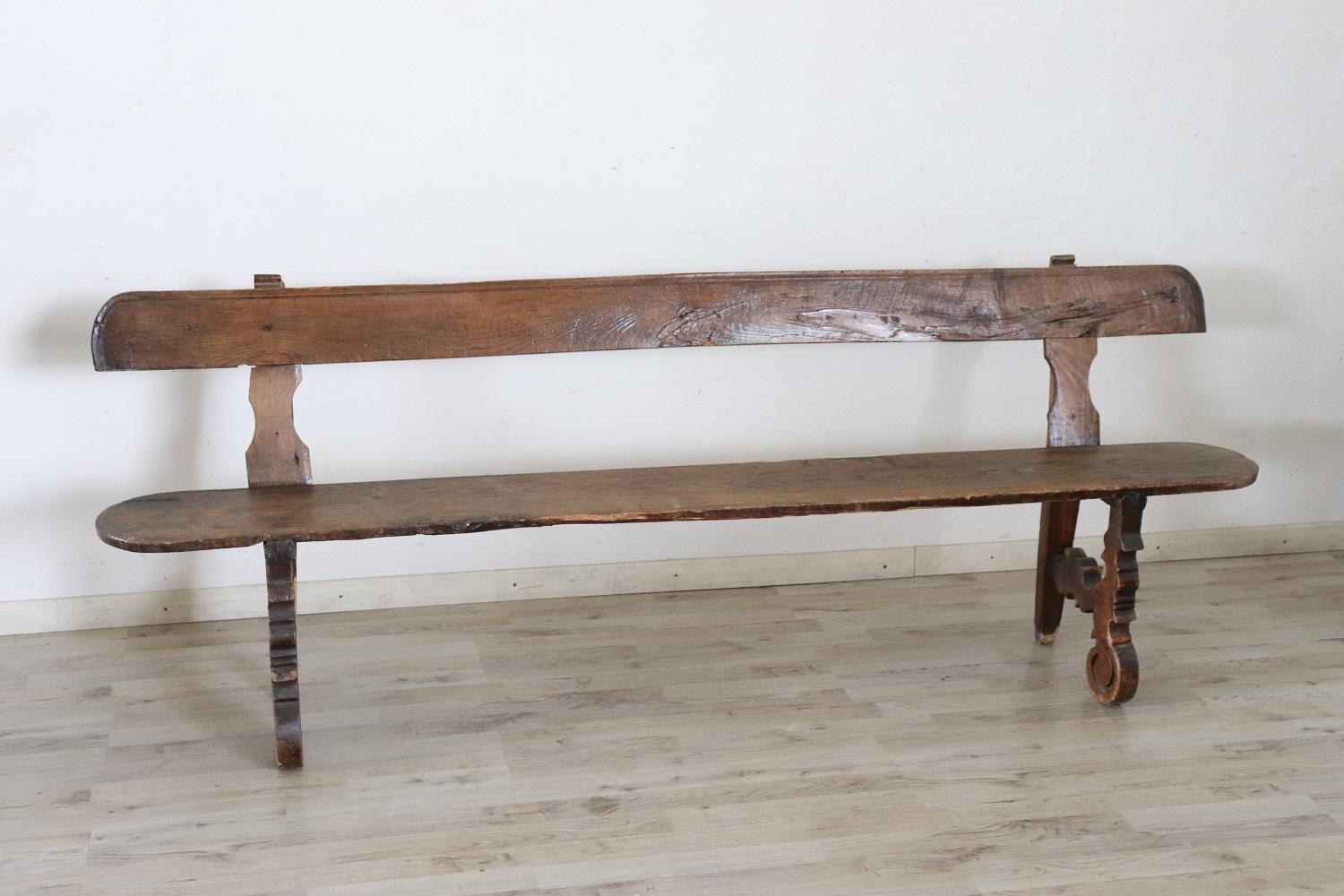 Antique Italian bench 1880s. The bench is made of solid oak wood. Excellent antique good conditions of the wood, some signs of wear.