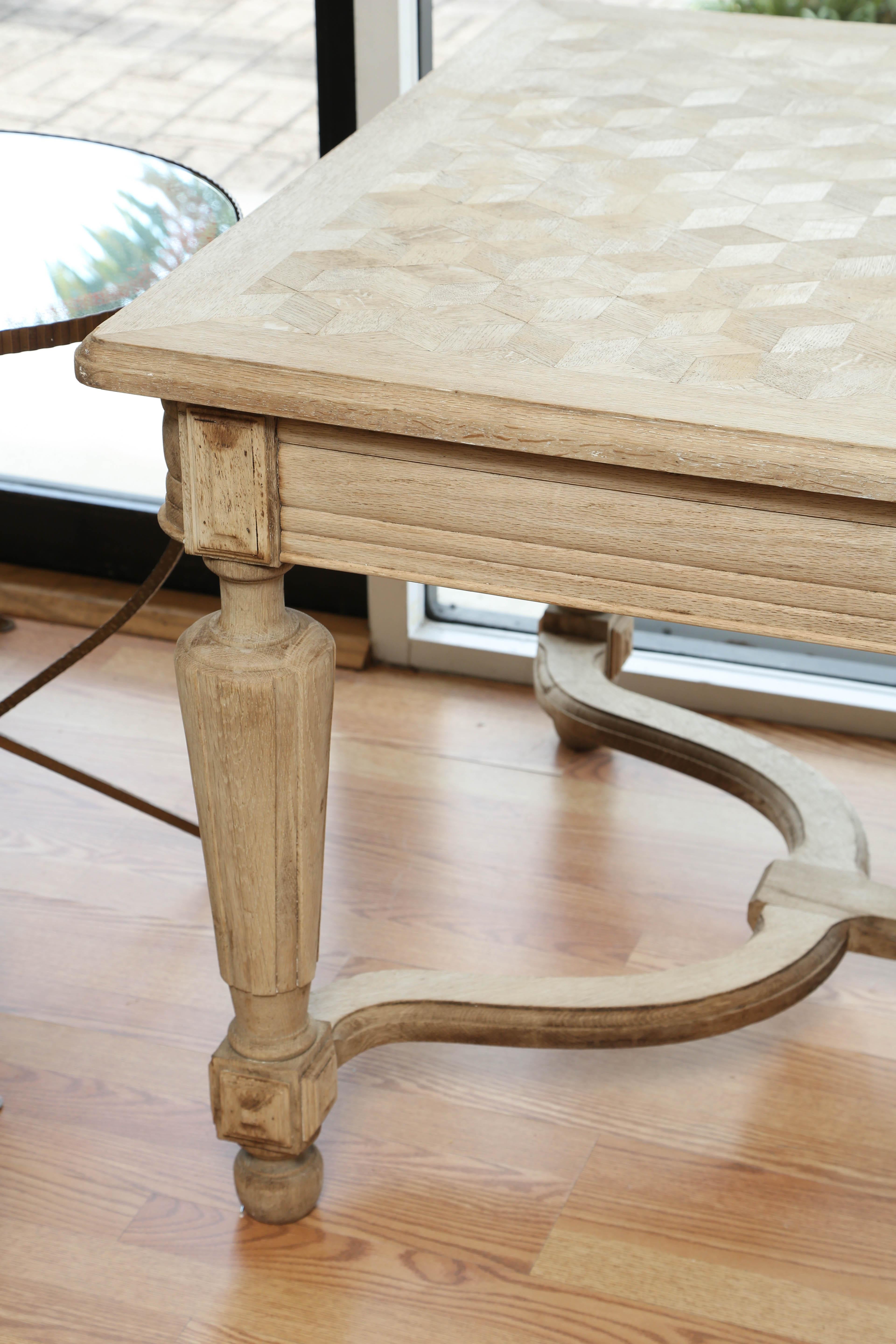 Antique bleached oak parquet top table.