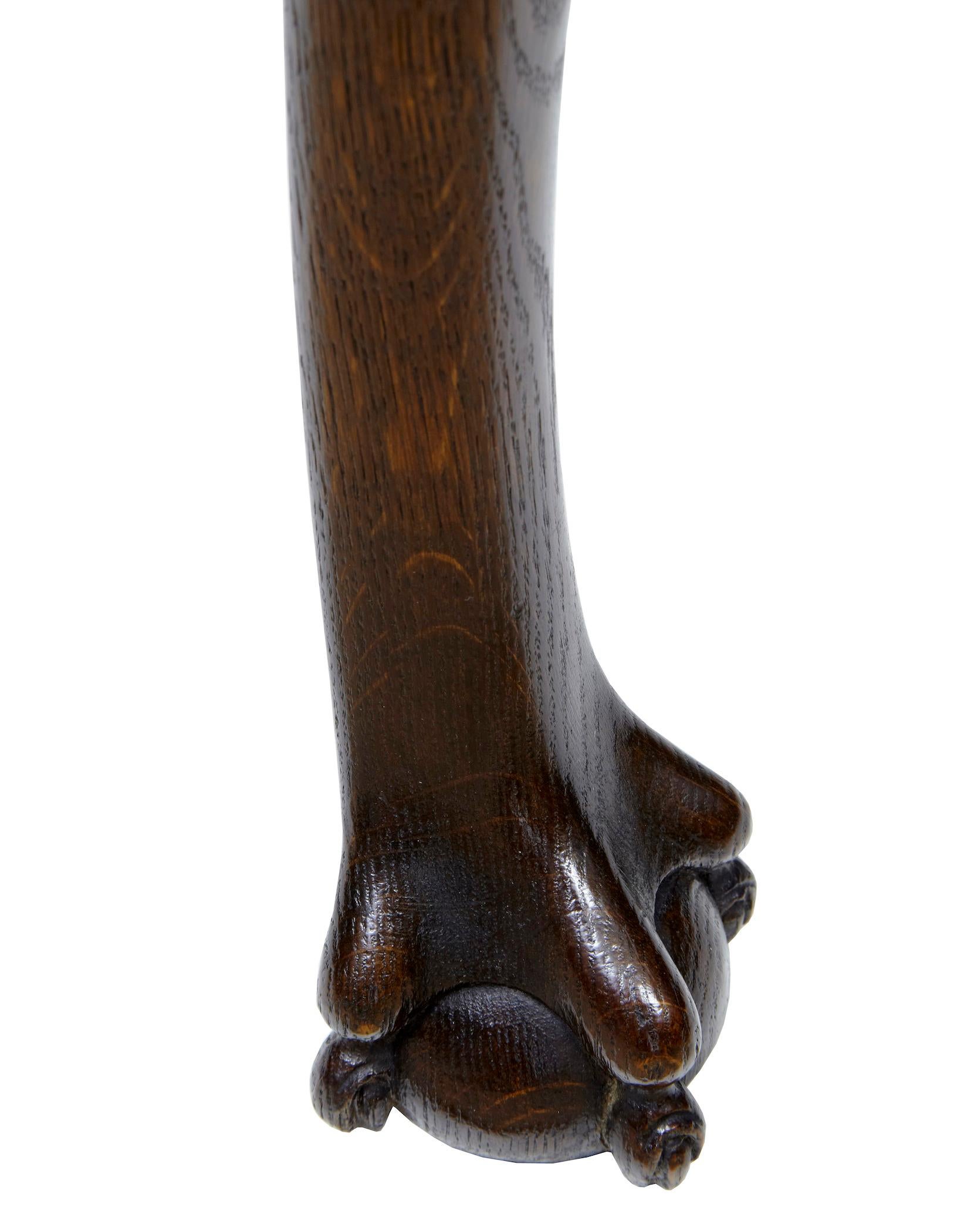 19th century oak chippendale influenced onyx top table circa 1890.

Unusual dish top silver table featuring a stunning solid onyx inset top. Shaped apron leading down to the 4 cabriole legs, standing on ball and claw feet.

Minor surface marks to