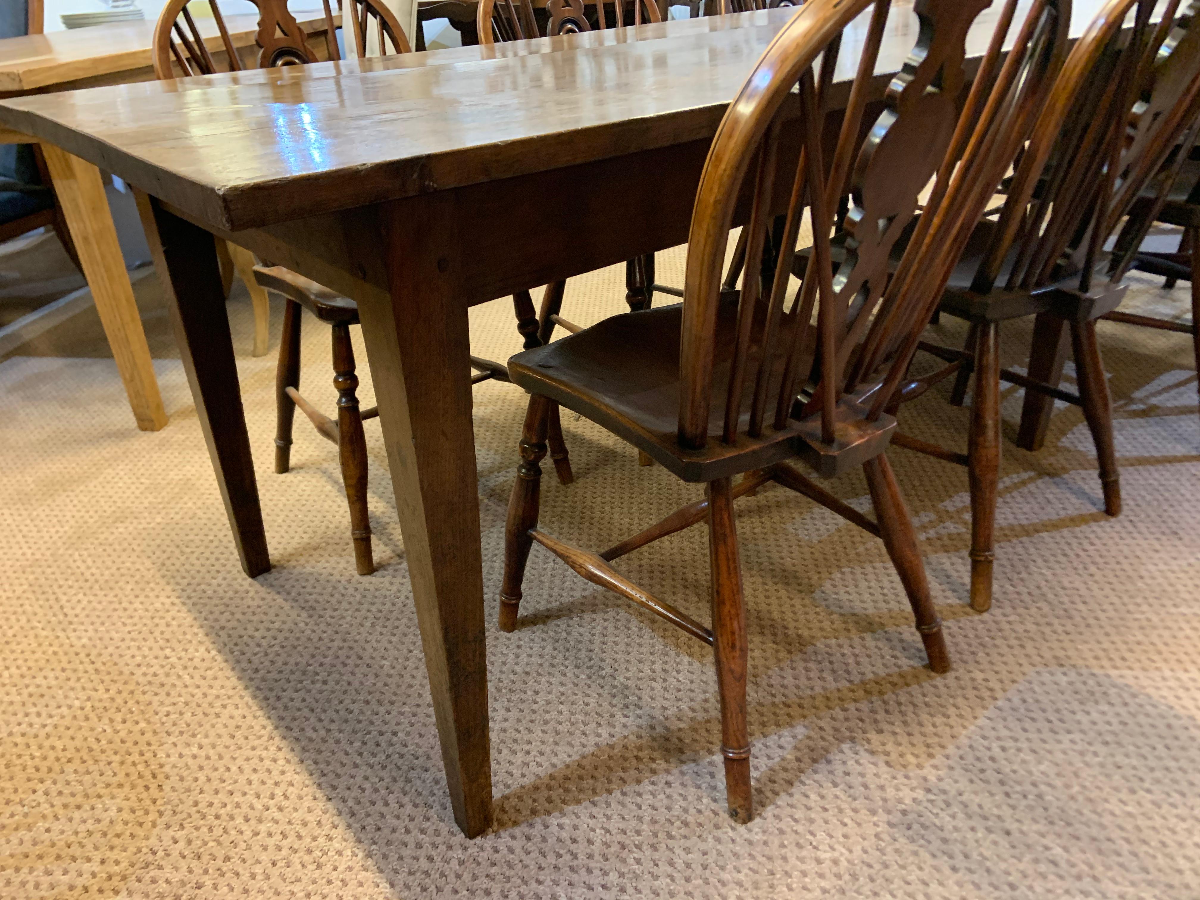Large 19th century oak farmhouse table with six tapered legs, and a lovely gorgeous rustic top. 
 