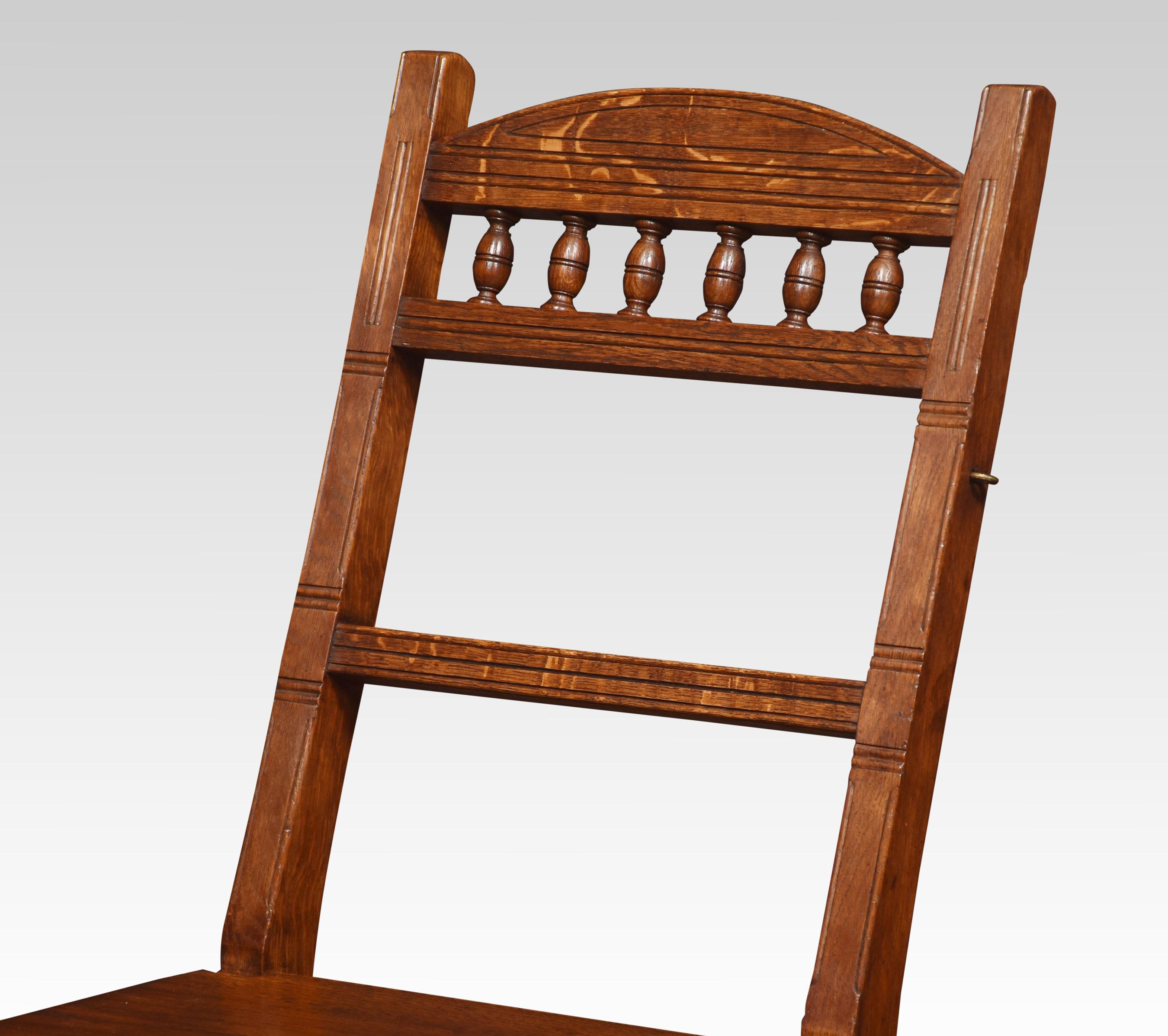 19th Century oak metamorphic chair, with spindle back above solid seat the chair opens into a sturdy set of Library steps.
Dimensions
Height 35 Inches height to seat 17.5 Inches
Width 17 Inches
Depth 20 Inches