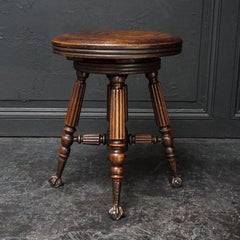 19th Century Oak Piano Stool with Claw Feet Holding Glass Ball by H.D. Bentley