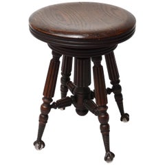 Antique 19th Century Oak Piano Stool with Claw Feet Holding Glass Ball by H.D. Bentley
