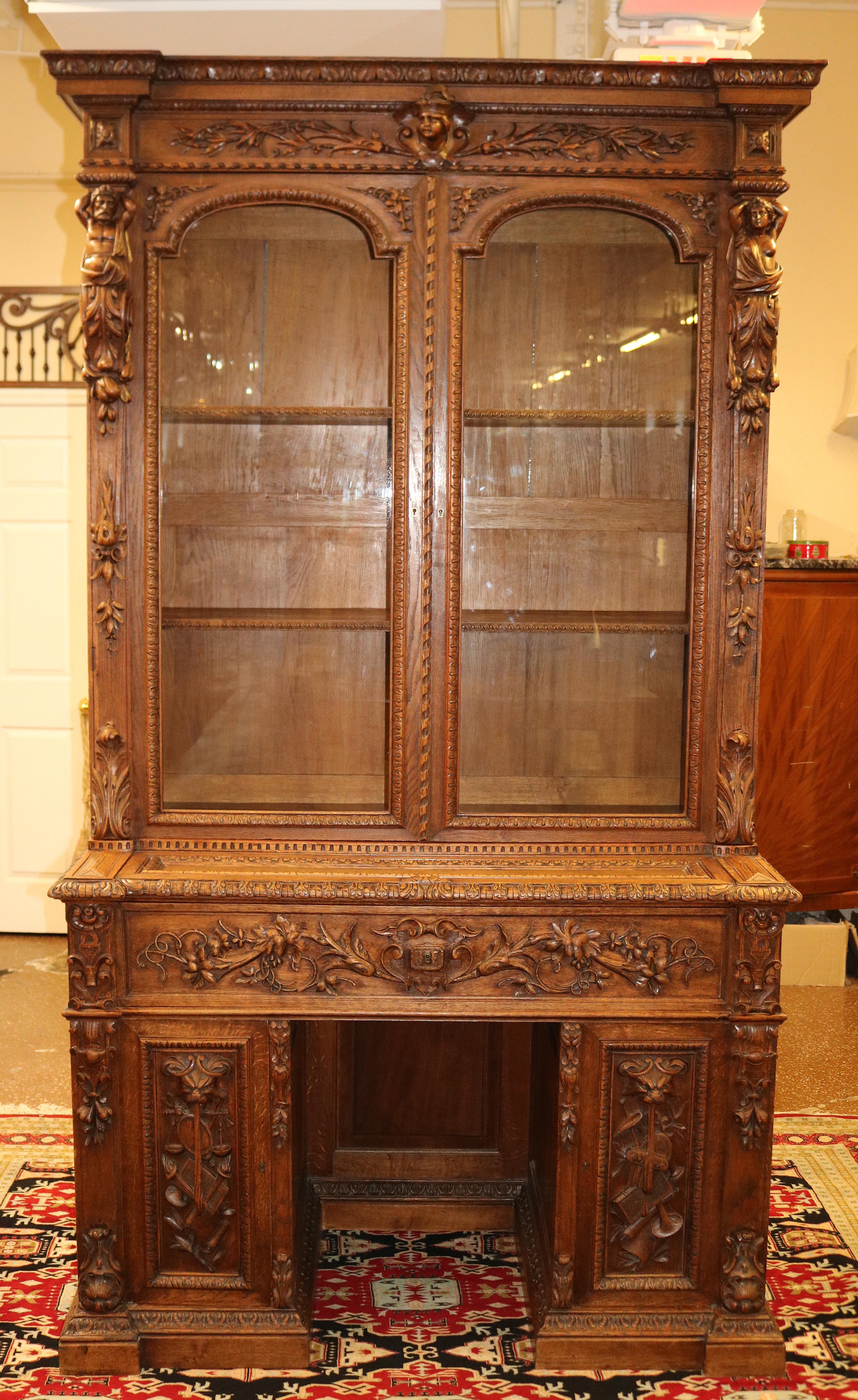​19th Century Oak Renaissance Revival Figural Secretary Desk Cabinet

Dimensions : 98 Tall X 56 Wide X 26 Deep

This secretary desk was made in France in the late 19th century. The carvings are magnificent and the oak grain is killer! The figures