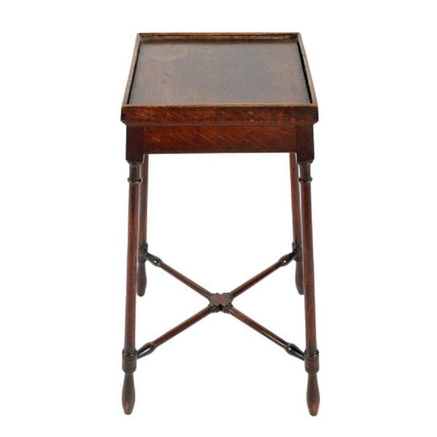 An early 19th century Scottish oak urn stand.

The stand has four splay turned legs that have turned diagonal cross stretchers.

The stand has a square top that has a low raised gallery with a rounded edge.

The stand is in original condition