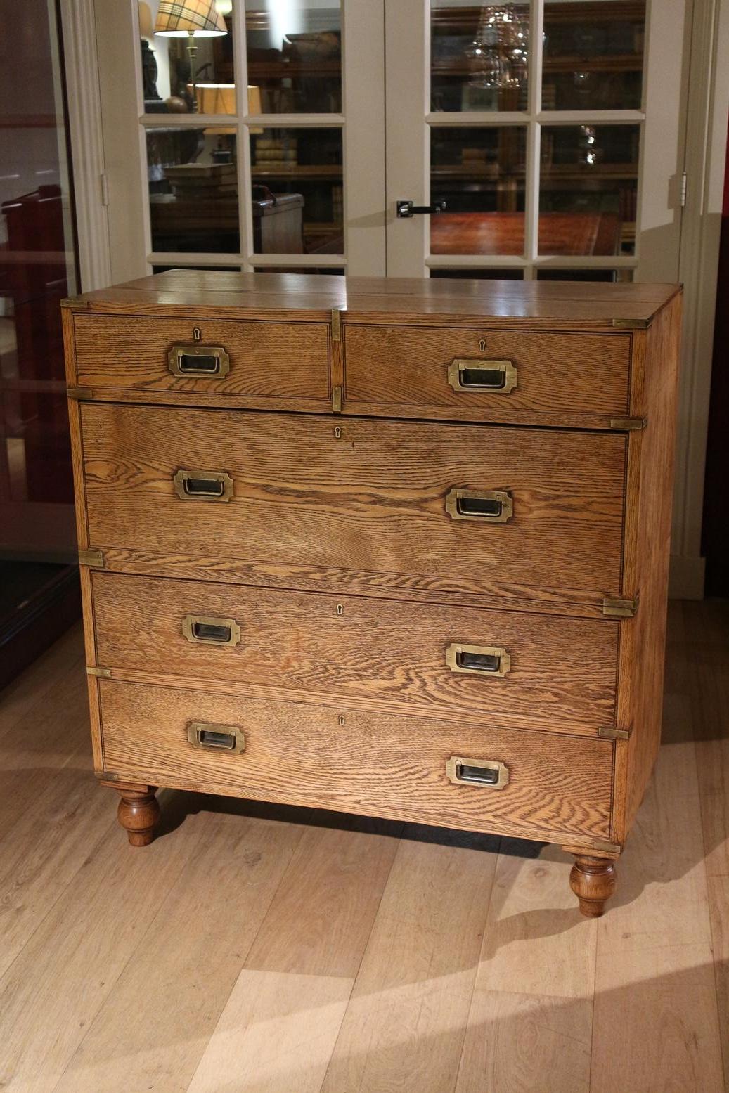 Here we have a fine military chest in oak. The chest is made in two sections for the ease of transportation, either by sea or pack horse and mule.
This particular chest would have been made for an officer for Campaign.
The chest of drawers has the