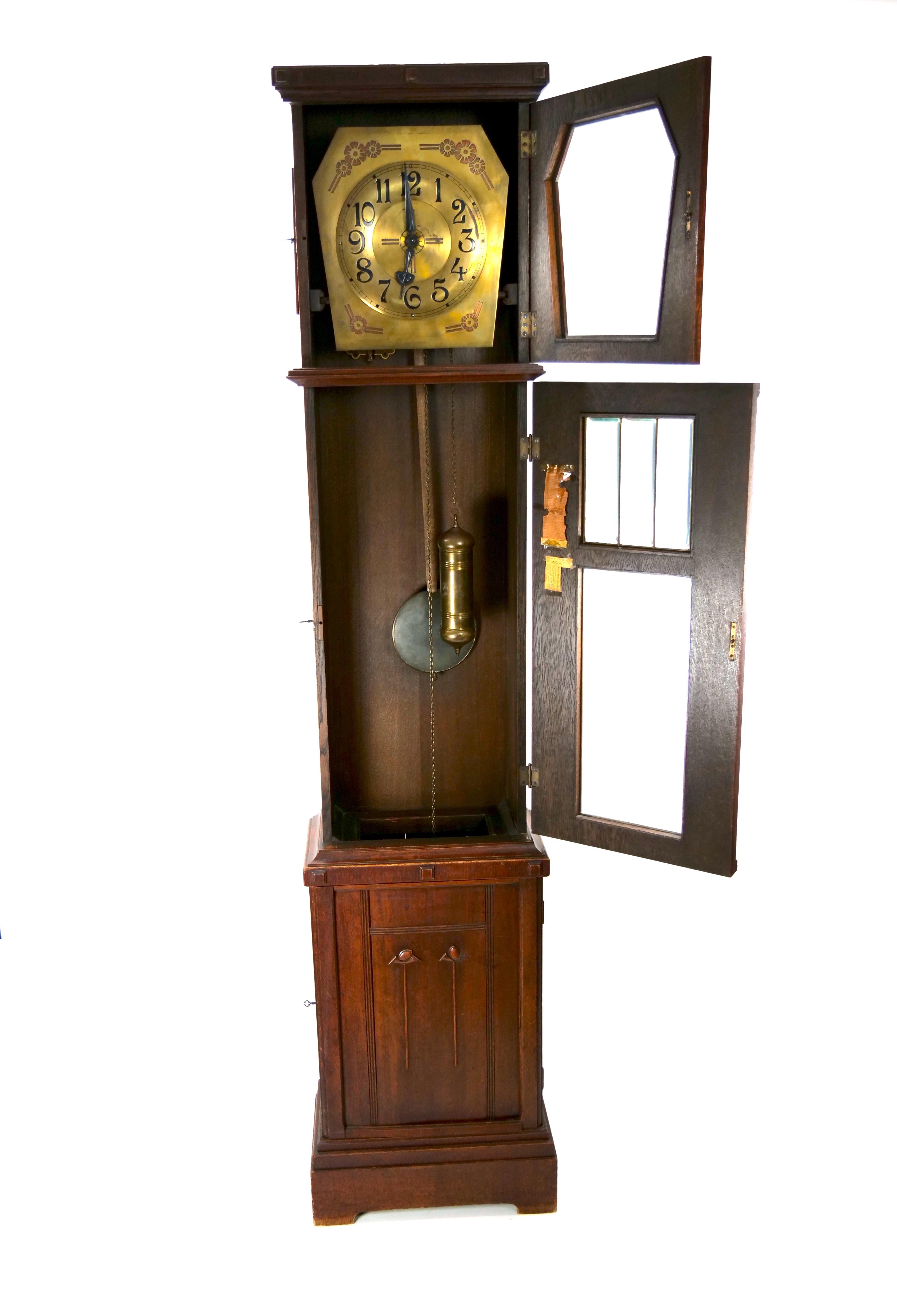 Mid-19th century oak frame with gilt brass and glass tall case clock. The case clock is in good condition with appropriate wear consistent with age / use. Maker's mark inscribe. The tall case clock measure 83 inches high x 17 inches wide x 9 1/2