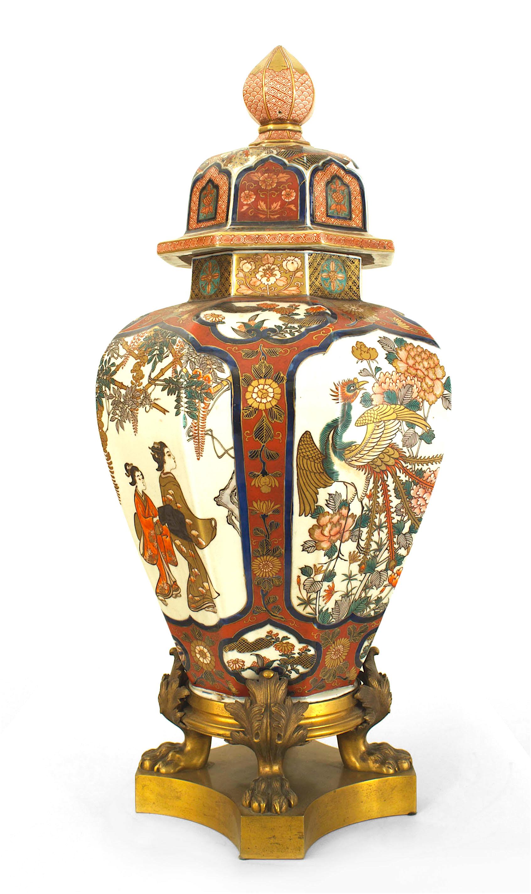 Chinoiserie 19th Century Octagonal Imari Porcelain Lidded Vase Mounted on a Bronze Dore Base For Sale