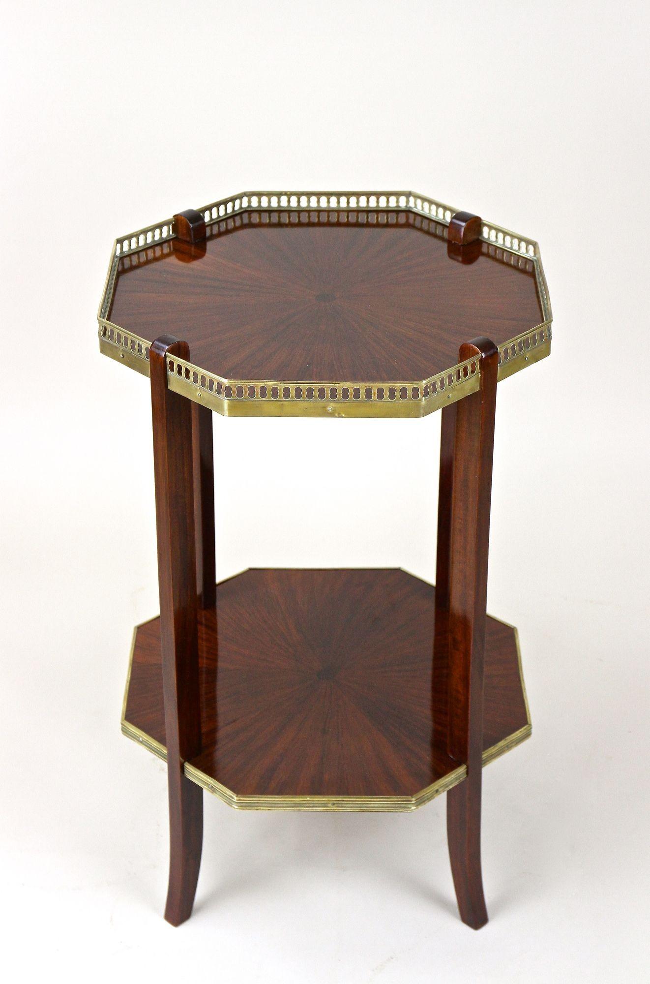 Elaborately crafted late 19th century side table from the renowned Napoleon III period in France around 1870. A unique, octagonal shaped French mahogany side table with many delicate and superbly processed details. This antique French side table