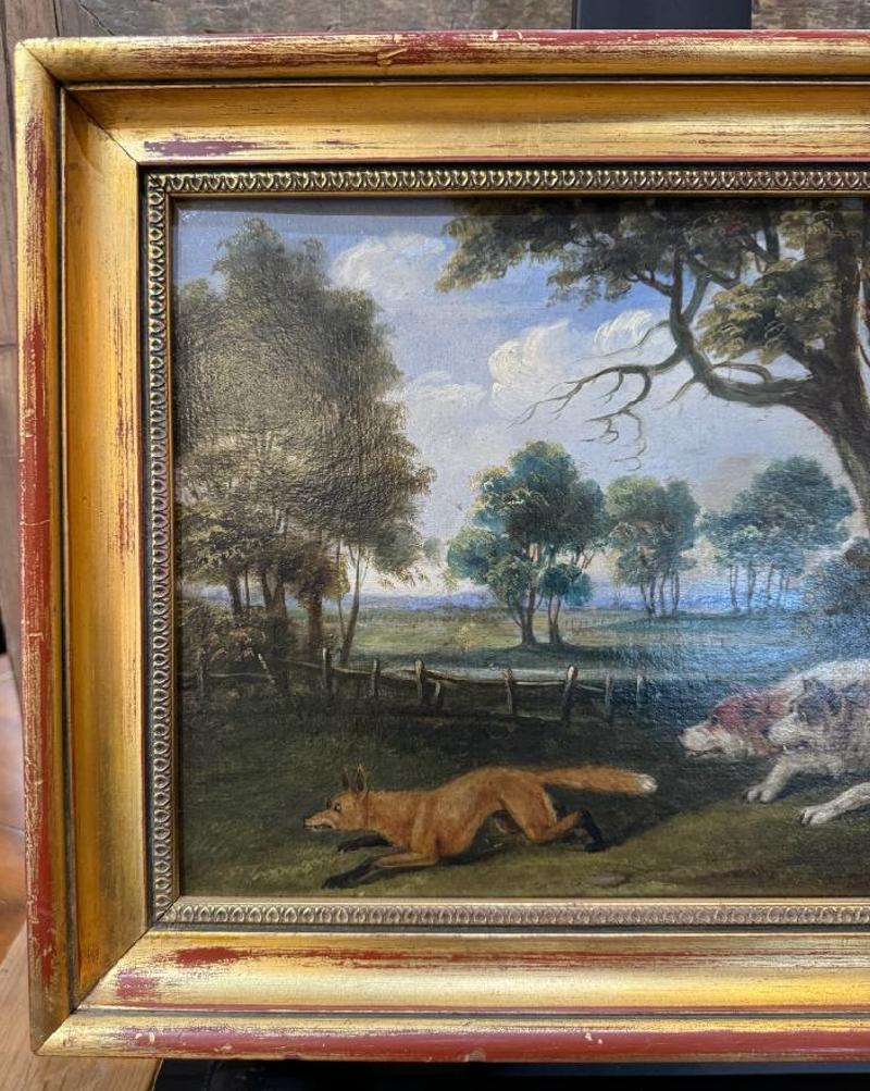 ;Peinture de paysage à l'huile sur carton du 19e siècle représentant des chiens chassant le renard
Signé 