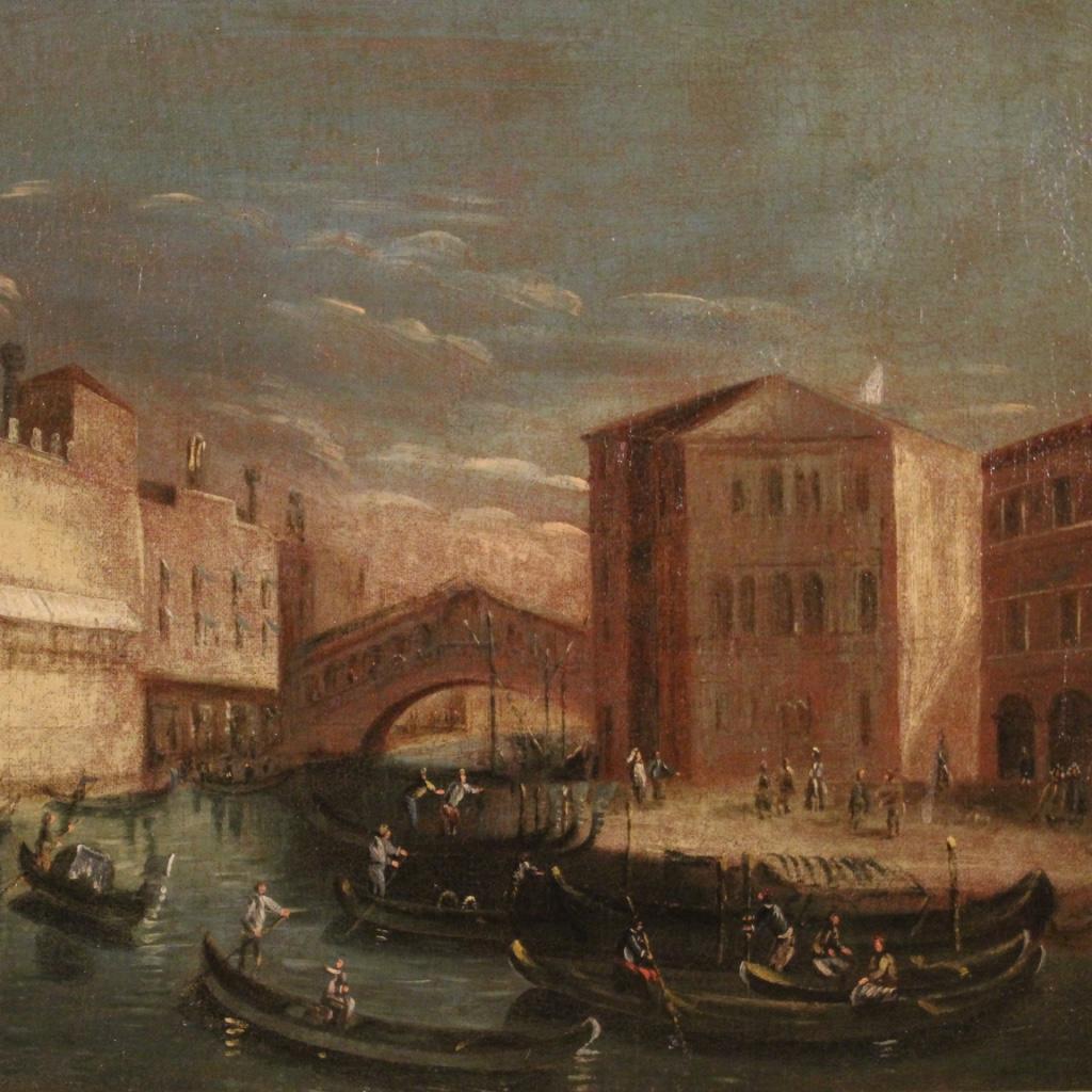 Antique Italian painting from the second half of the 19th century. Oil painting on canvas depicting a view of Venice, Ponte Di Rialto with gondolas, of good pictorial quality. Painting in 18th century style of beautiful size and pleasant decor with