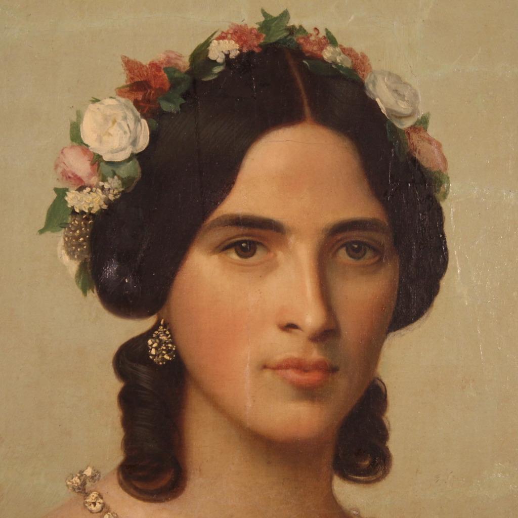 Antique Italian painting from the second half of the 19th century. Oil on canvas artwork depicting a female portrait, young girl with flowered headdress of excellent pictorial quality. Nicely sized painting with pleasant decor adorned with a