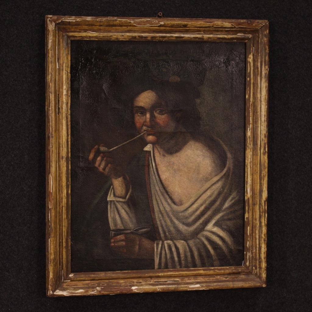Antique Italian painting from the early 19th century. Oil painting on canvas depicting a pipe smoker portrait, of good pictorial quality. Framework that has undergone a conservative restoration, recovery of color in some places and has been backed