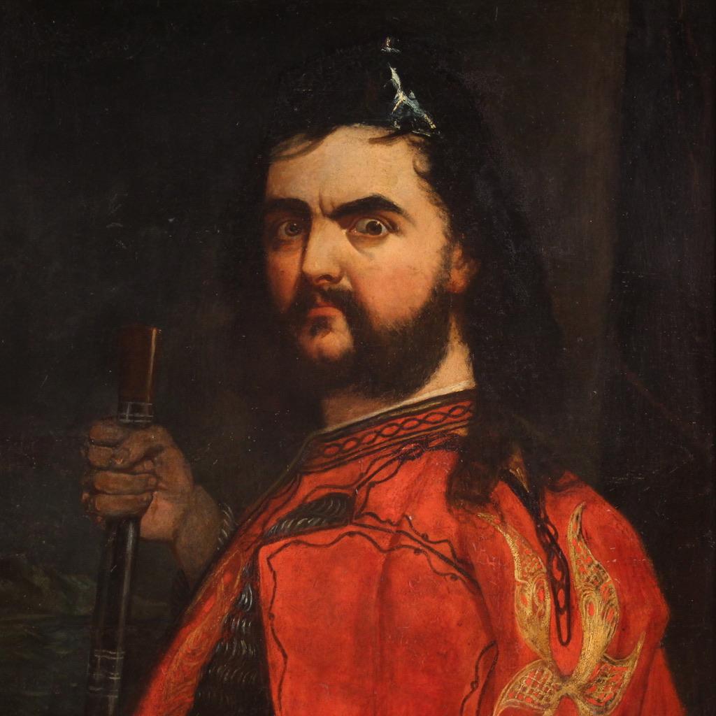 Antique 19th century Flemish painting. Oil on canvas artwork depicting a particular male portrait with red cape of excellent pictorial quality. Difficult to read painting with signature and date in the lower left corner (see photo) under study.