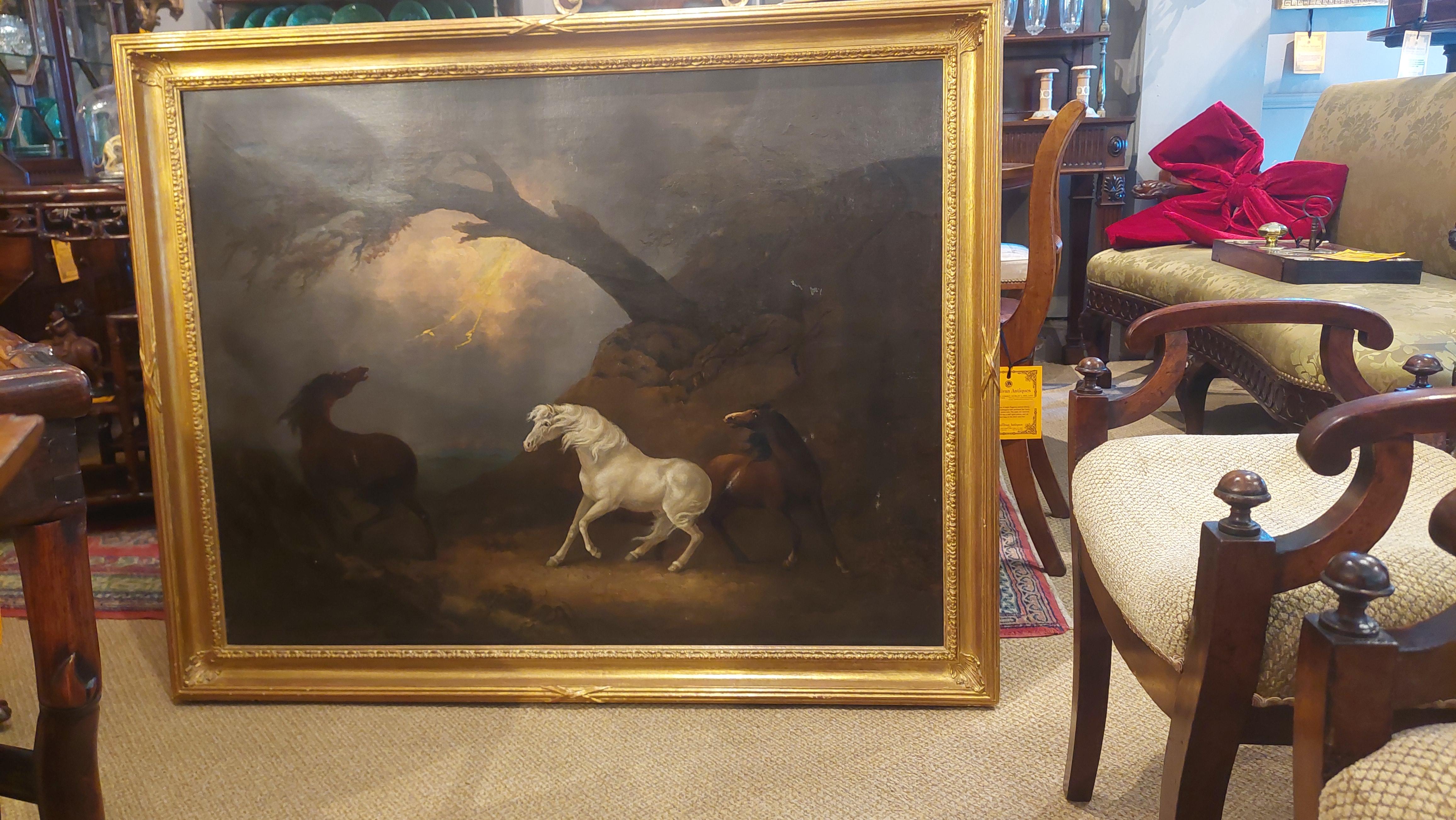 19th Century oil on canvas painting, depicting an atmospheric scene of three horses to foreground with a thunderstorm in the background. Dramatic tension is created by the play of light and shadow and is heightened by the bolt of lightning. The
