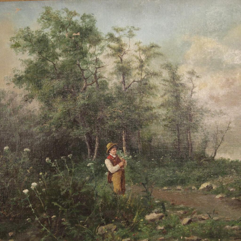 French painting from the second half of the 19th century. Oil painting on canvas depicting a woodland landscape with a child signed on the lower right signature in the study phase. Framework of pleasant decor complete with gilded wooden frame from