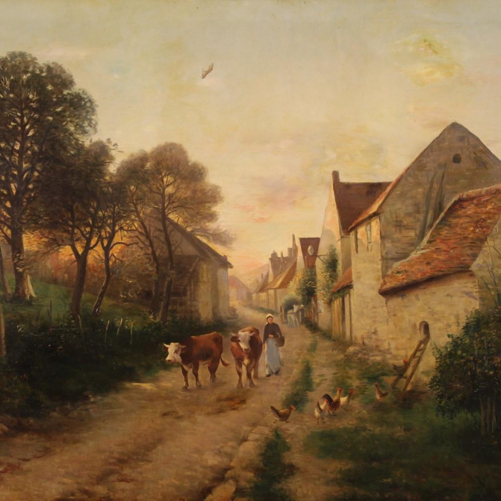 Large French painting dated 1899. Oil painting on canvas, first canvas, depicting a view of a country village with characters and animals of good pictorial quality. Beautifully decorated carved and gilded wood and plaster frame with some lacks of