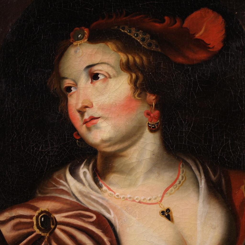 Elegant painting portrait of a lady from the first half of the 19th century. Oil on canvas artwork depicting a female half-length figure in sumptuous Baroque attire. The lady wears splendid jewelry and a plumed hat reminiscent of the iconography of