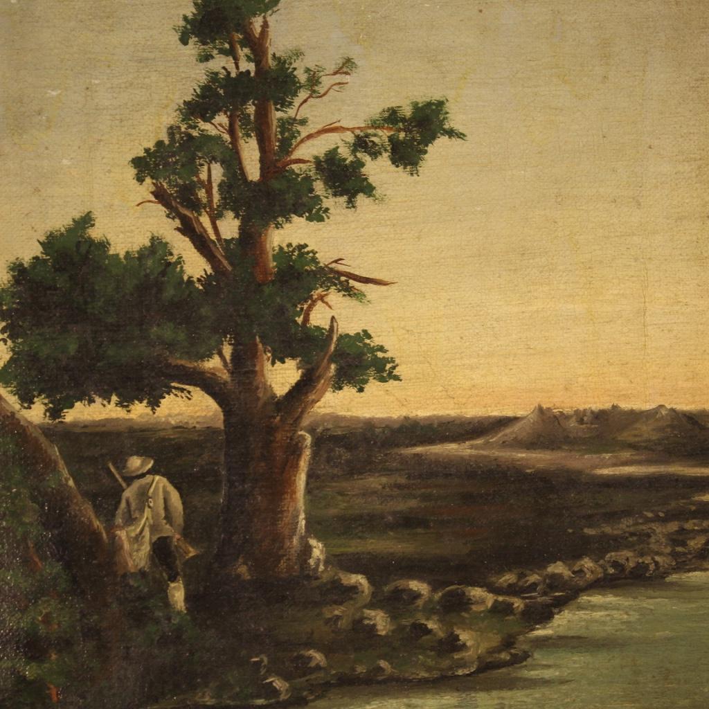 Small Italian painting from the second half of the 19th century. Oil painting on canvas, first canvas, depicting landscape with a hunter of good pictorial quality. Signed and dated painting on the lower left, acronym under study. Framework for